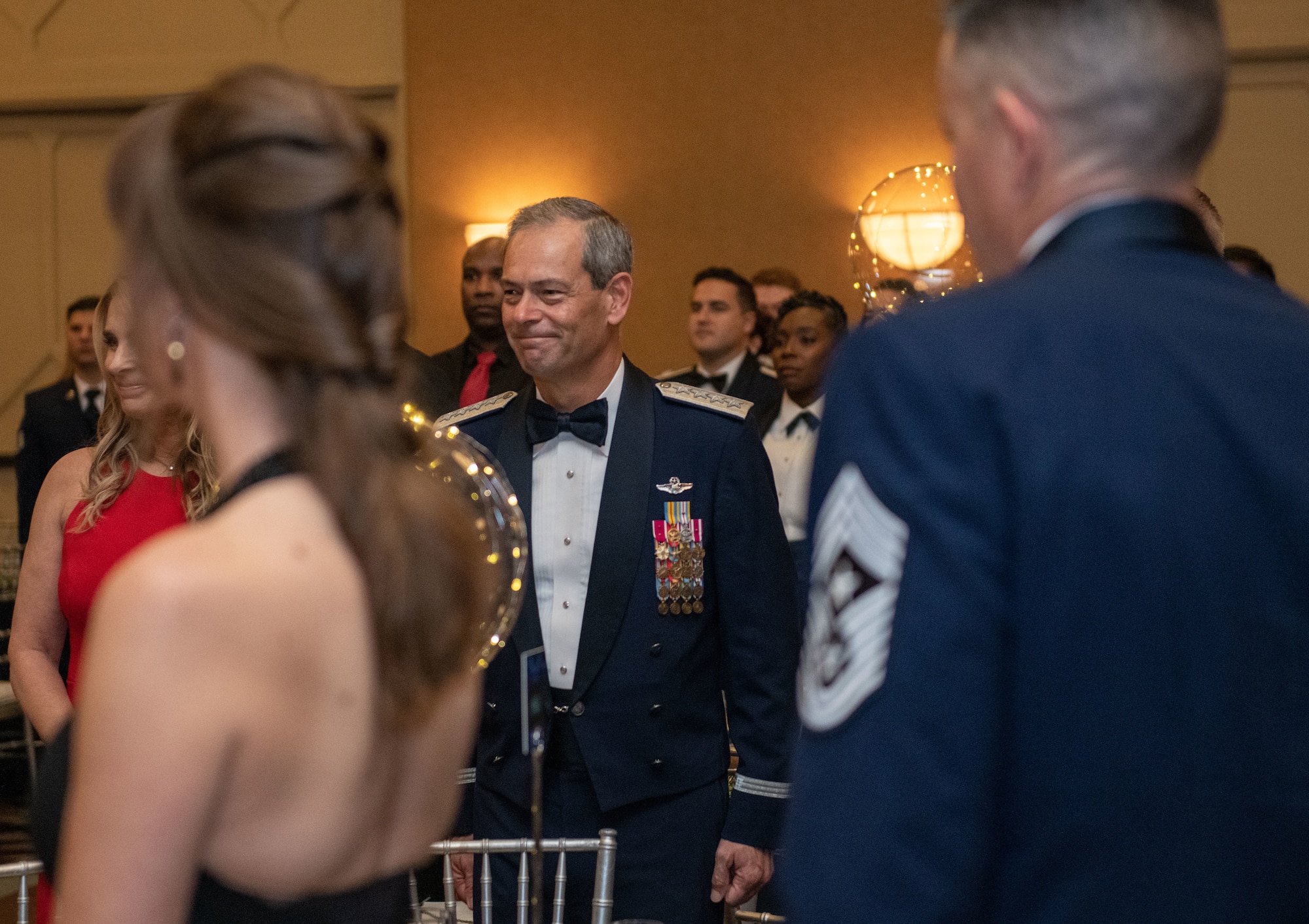 U.S. Air Force Gen. Ken Wilsbach, Pacific Air Forces commander, enters the ballroom at the Wigwam Resort for the 75th Air Force Ball near Luke Air Force Base, Arizona on Sept. 24, 2022.