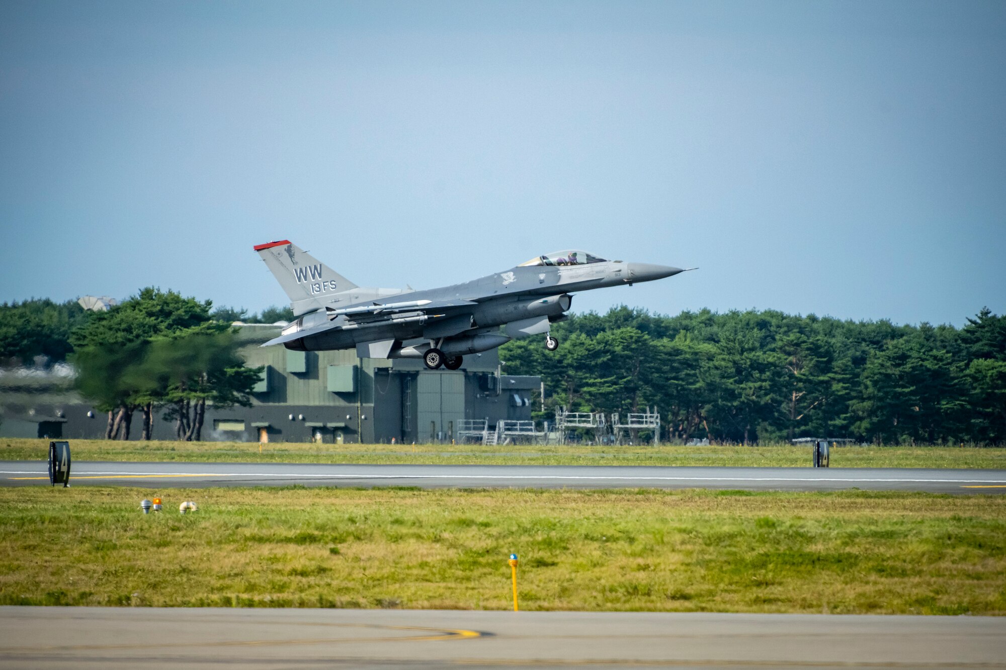A jet takes off on the runway