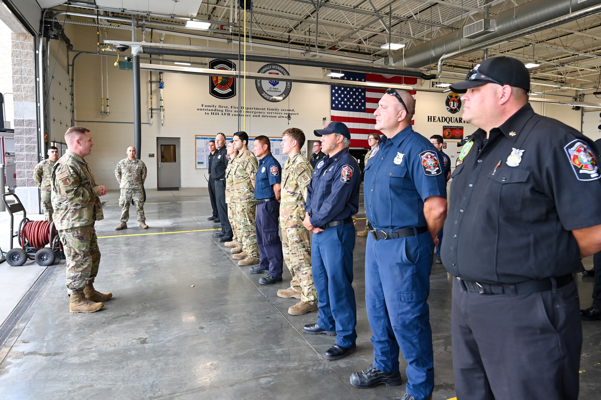 Col. Jeffrey Holland, 75th Air Base Wing commander, speaks to firefighters from 775th Civil Engineering Group Sept. 29, 2022.