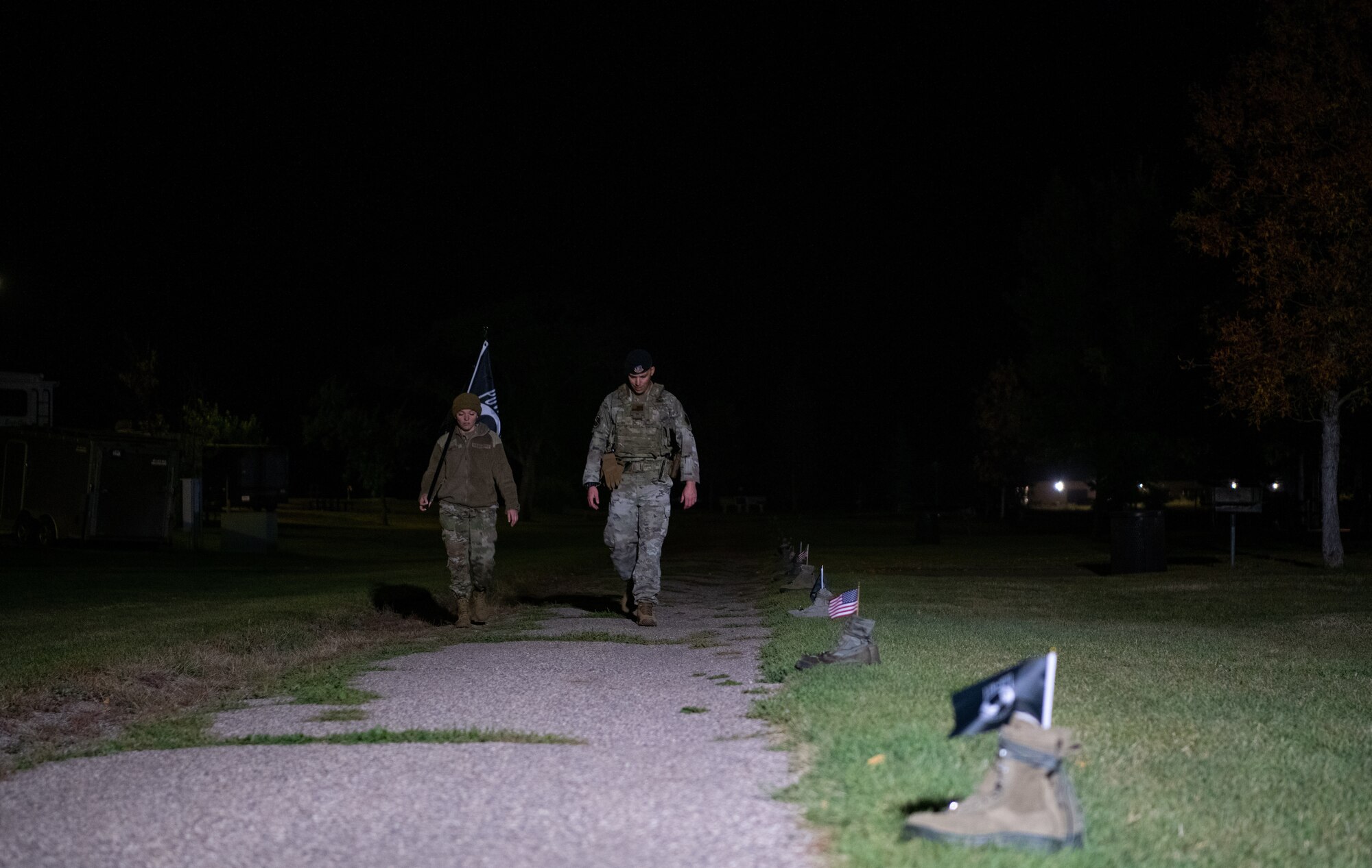 Team Minot Airmen participate in a POW/MIA commemoration run, Minot Air Force Base, North Dakota, Sept. 29, 2022.