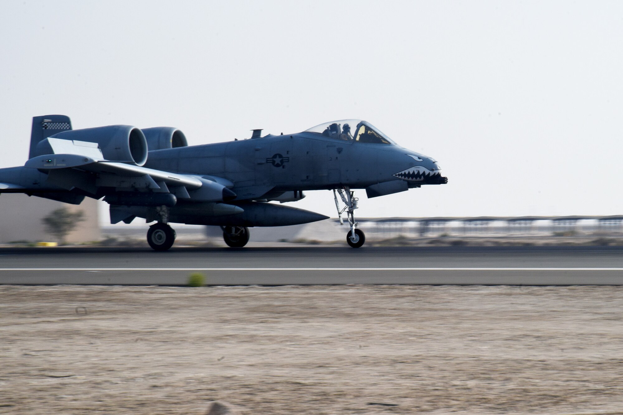 A U.S. Air Force A-10 Thunderbolt II of the 75th Expeditionary Fighter Squadron approaches for landing at Al Dhafra Air Base, United Arab Emirates, March 31, 2023. The arrival of the 75th EFS and 75th Expeditionary Fighter Generation Squadron will provide additional capabilities in close air support within the U.S. Central Command area of responsibility. (U.S. Air Force photo by Tech. Sgt. Chris Jacobs/released)