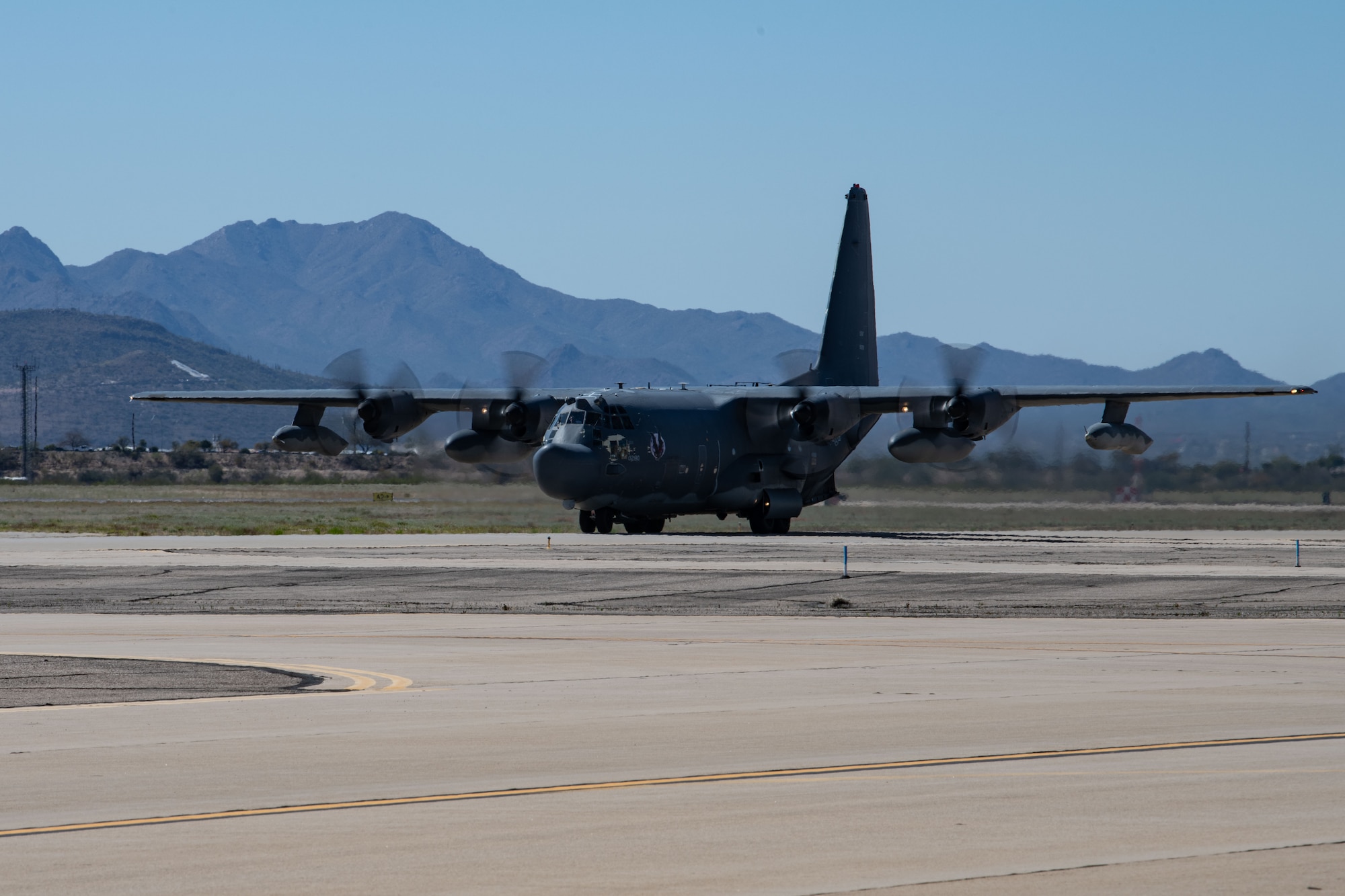 As members of the 15th Special Operations Squadron prepared for takeoff, families, friends and former MC-130H crew joined them to say goodbye to the aircraft.