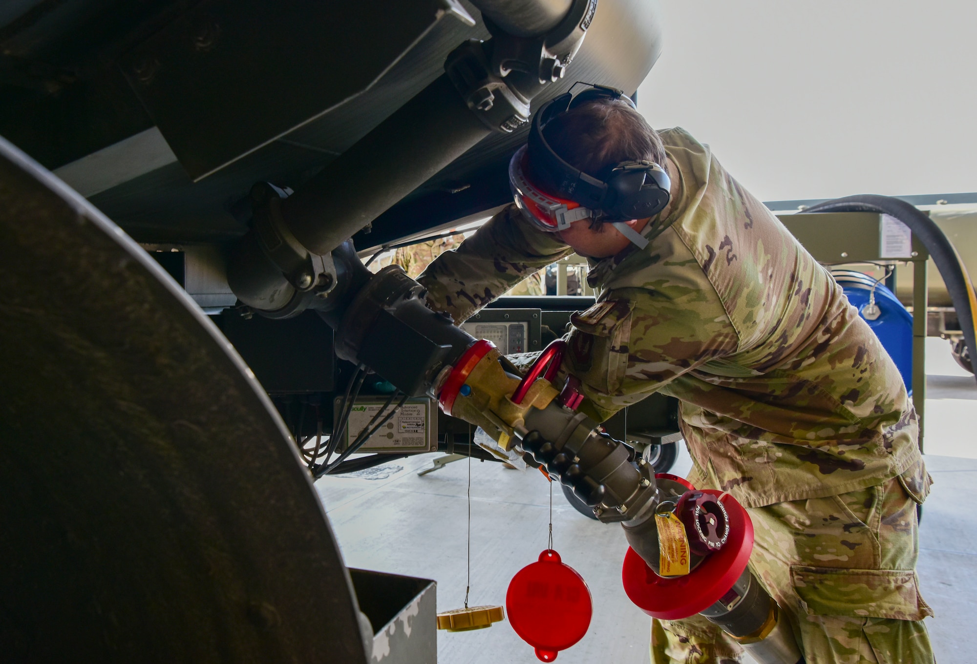 Tech. Sgt. Kyle King, 31st Logistics Readiness Training and Support supervisor demonstrates capabilities of the new Fluid Powered Additive Injector Carts concept to Mission Support Group leadership