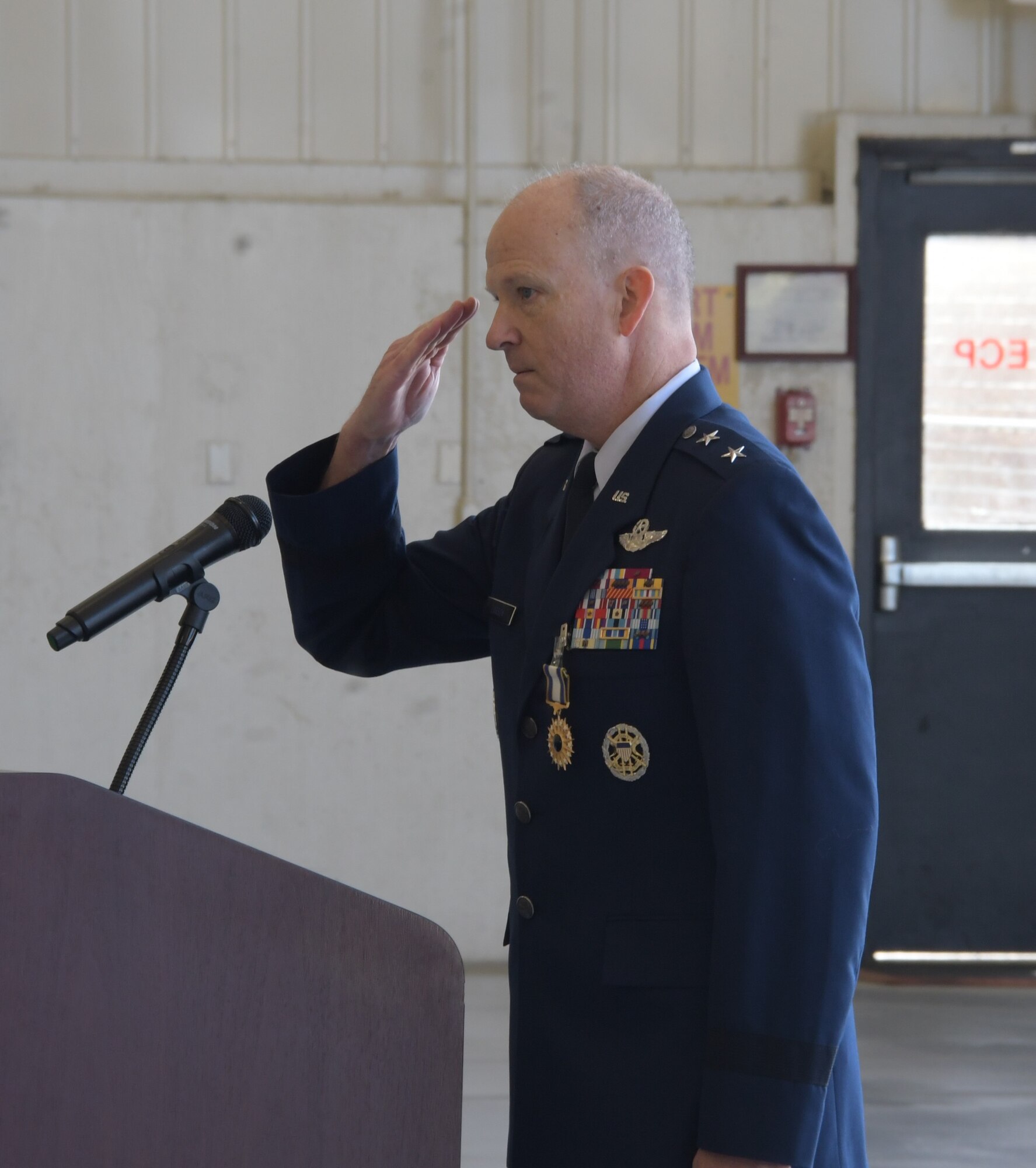 Outgoing commander, Maj. Gen. Bret C. Larson salutes the Airmen of 22nd Air Force during the 22nd Air Force change of command ceremony at Dobbins Air Reserve Base, Georgia, April 2, 2023.