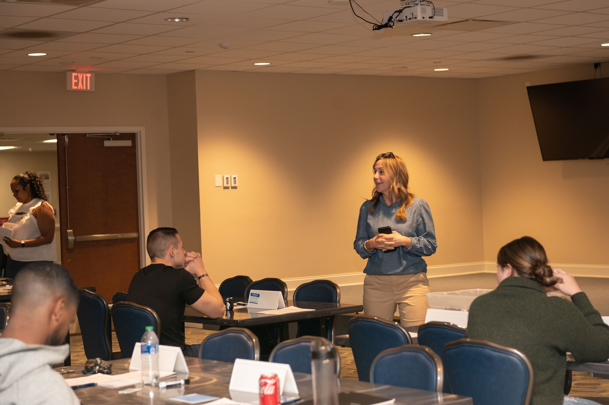 Candace Young, 4th Fighter Wing prevention coordinator specialist, speaks to attendees about helping agencies and how to contact them during Resilience University at Seymour Johnson Air Force Base, North Carolina, March 28, 2023. Resilience University is a two-day training for military members, spouses and civilians. During the two-day training classes are facilitated by agencies on base to include; Military and Family Readiness Center, Military and Family Life Counselor, Prevention Specialist, Wayne Cares, Tedi Bear, CAC out of ECU Broad School of Medicine, Equal Opportunity, Legal, Health and Nutrition and a certified Financial Advisor.  (U.S. Air Force photo by Airman 1st Class Rebecca Sirimarco-Lang)