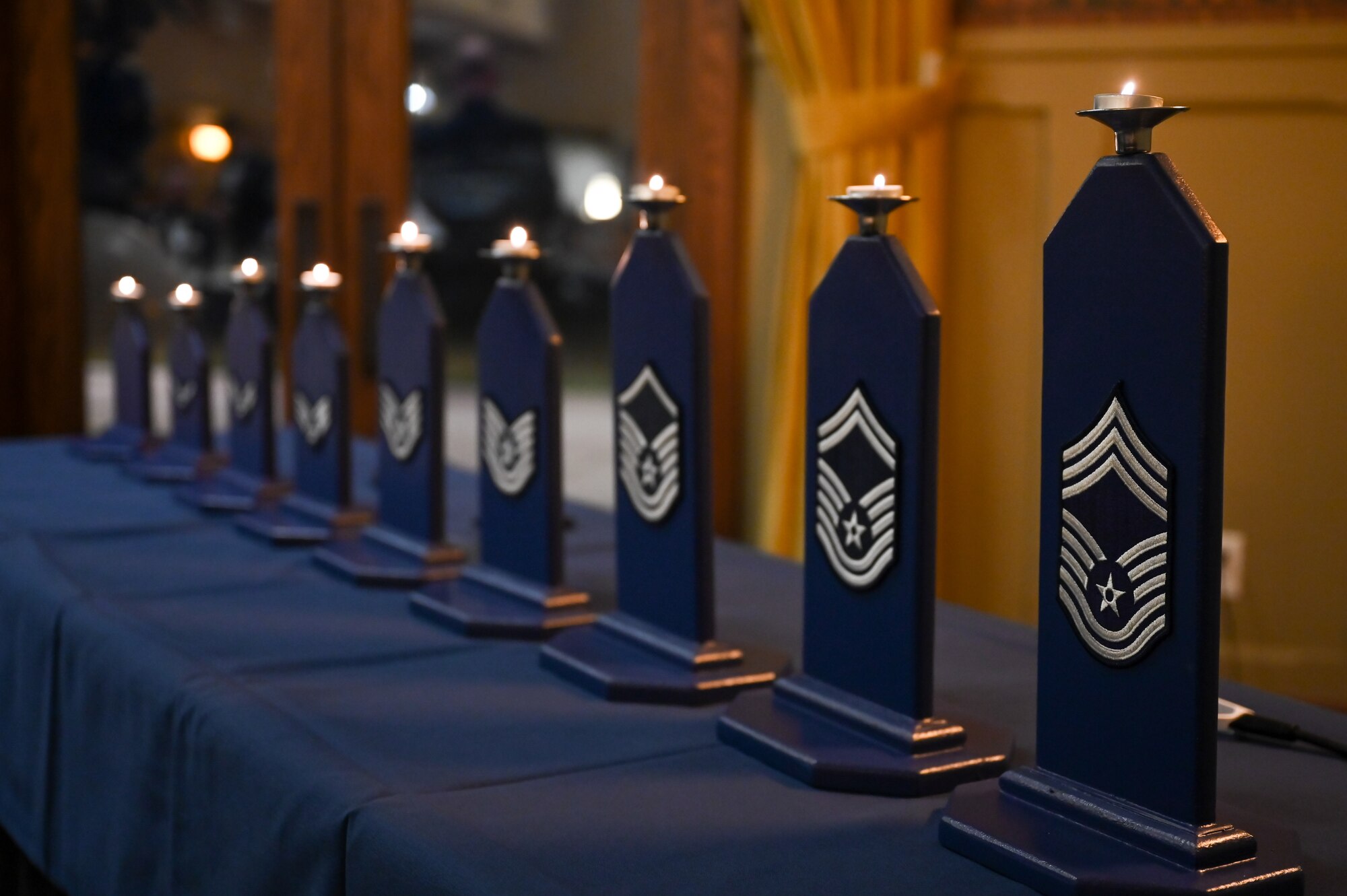 All nine candles are lit representing each of the nine enlisted ranks in the United States Air Force during Hill Air Force Base's Chief Induction Ceremony