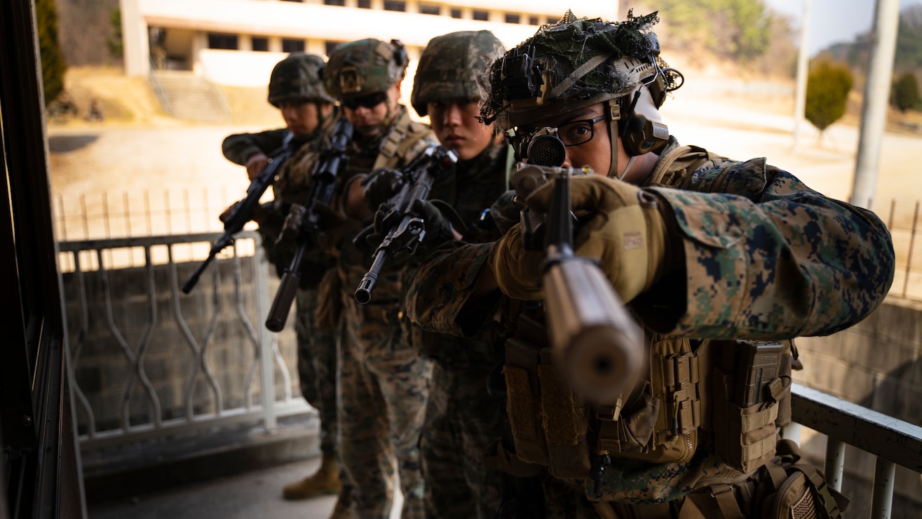 U.S. Marines with 3rd Battalion, 6th Marines and Republic of Korea Marines with 3rd Battalion, 1st Regiment, 2nd Marine Division prepare to clear a building while conducting urban training during Korean Marine Exercise Program 23.3 at Rodriguez Live-fire Complex, Republic of Korea, March 28, 2023. KMEP is a series of continuous-combined training exercises designed to enhance the ROK-U.S. Alliance, promote stability on the Korean Peninsula, and strengthen combined military capabilities and interoperability. 3rd Battalion, 6th Marines is forward deployed in the Indo-Pacific under 4th Marines, 3rd Marine Division as part of the Unit Deployment Program.