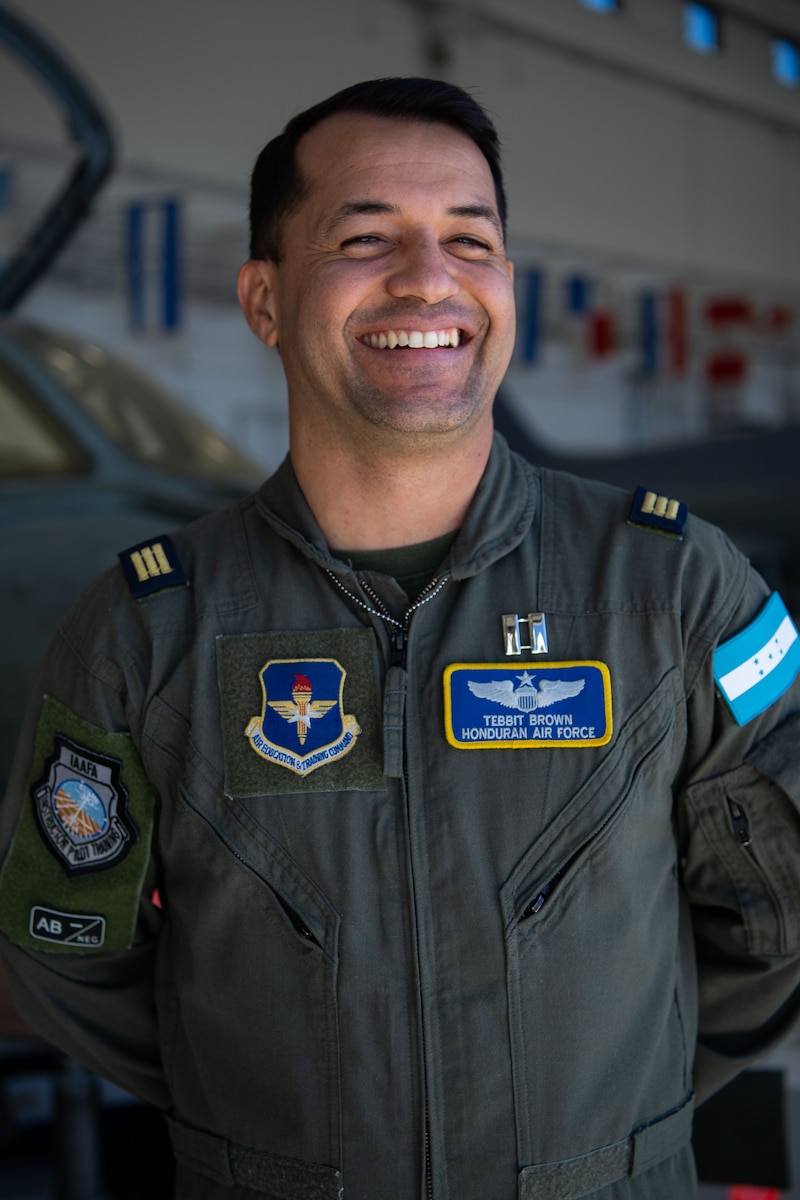 Capt. Tebbit Brown poses for a portrait at Joint Base San Antonio-Lackland, Texas, Nov. 30, 2022. Brown is a pilot in the Honduran Air Force and is currently a partner nation guest instructor for the Inter-American Air Forces Academy’s Pilot Instrument Procedures Course. “I had the opportunity to come to PIP-C as a student and as an instructor, I’ve had the opportunity to earn my wings,” Brown explained. “When you wear the IAAFA wings people recognize them and you wear them with confidence.” (U.S. Air Force photo by Tech. Sgt. Janiqua P. Robinson)