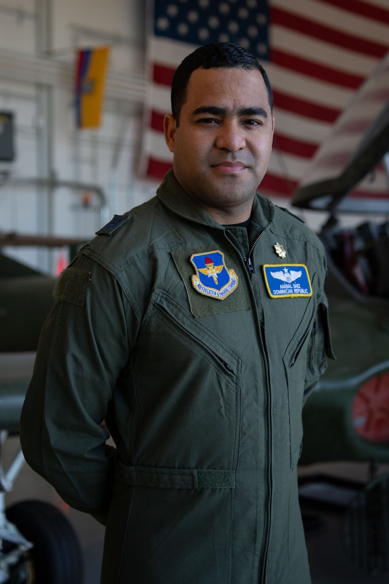 Maj. Aníbal Báez poses for a portrait at Joint Base San Antonio-Lackland, Texas., Nov. 30, 2022. Báez is a pilot in the Dominican Air Force and is currently a partner nation guest instructor for the Inter-American Air Forces Academy Pilot Instrument Procedures Course. “My favorite part about this course is that the individuals are very different,” Báez explained. “Being able to differentiate everything about each student and how we can teach them in every aspect of being a pilot instructor.” (U.S. Air Force photo by Tech. Sgt. Janiqua P. Robinson)