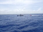 Coast Guard Cutter Joseph Tezanos’ small boat transfers a group of migrants to a Dominican Republic Navy vessel near Punta Cana, Dominican Republic April 1, 2023. Thirty-nine migrants were repatriated while one other man from this case, also a Dominican Republic national, is facing federal prosecution in Puerto Rico on charges of attempted illegal re-entry into the United States. (U.S. Coast Guard photo)