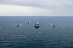 The aircraft carrier USS Nimitz (CVN 68) steams in formation with the Republic of Korea Navy (ROKN) destroyer ROKS Sejong the Great (DDG 991), Chungmugong Yi Sun-Sin-class multipurpose destroyer ROKS Choe Yeong (DDH 981), Cheonji-class fast combat support ship ROKS Hwacheon (AOE 59), the Arleigh Burke-class guided-missile destroyers USS Decatur (DDG 73) and USS Wayne E. Meyer (DDG 108) during a bilateral exercise. The Nimitz Carrier Strike Group is conducting a bilateral maritime exercise with the ROKN in the U.S. 7th Fleet area of operations. 7th Fleet is the U.S. Navy's largest forward-deployed numbered fleet, and routinely interacts and operates with Allies and partners in preserving a free and open Indo Pacific region.