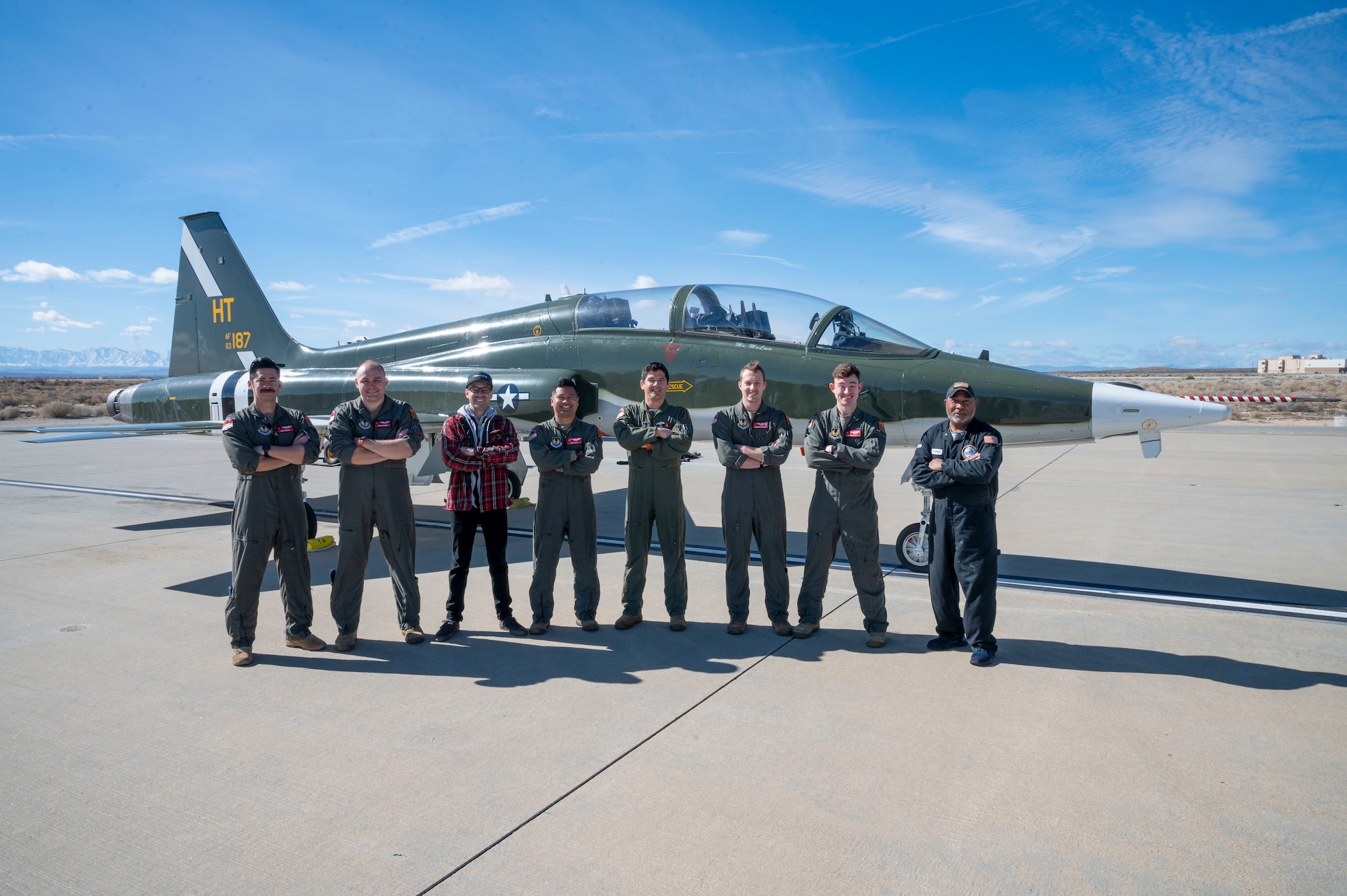 The "Have 5tarboy" team poses for a photo in front of a T-38C from Holloman. (Members from left to right: Capt. Steve "Nike" O'Briant, Project Pilot, Capt. Nathan "Loball" Raquet, Project Lead/Engineer, Joshua Morales, CEO of StarNav, Capt. Ajericho "Saint" Malia, Project Engineer, Squadron Leader Stephen "Tavo" Tavener Project Pilot (UK), Capt. Casey "Sandman" Slattery, Project Engineer, Maj. Matt "Doc" Daugherty, Project Pilot)