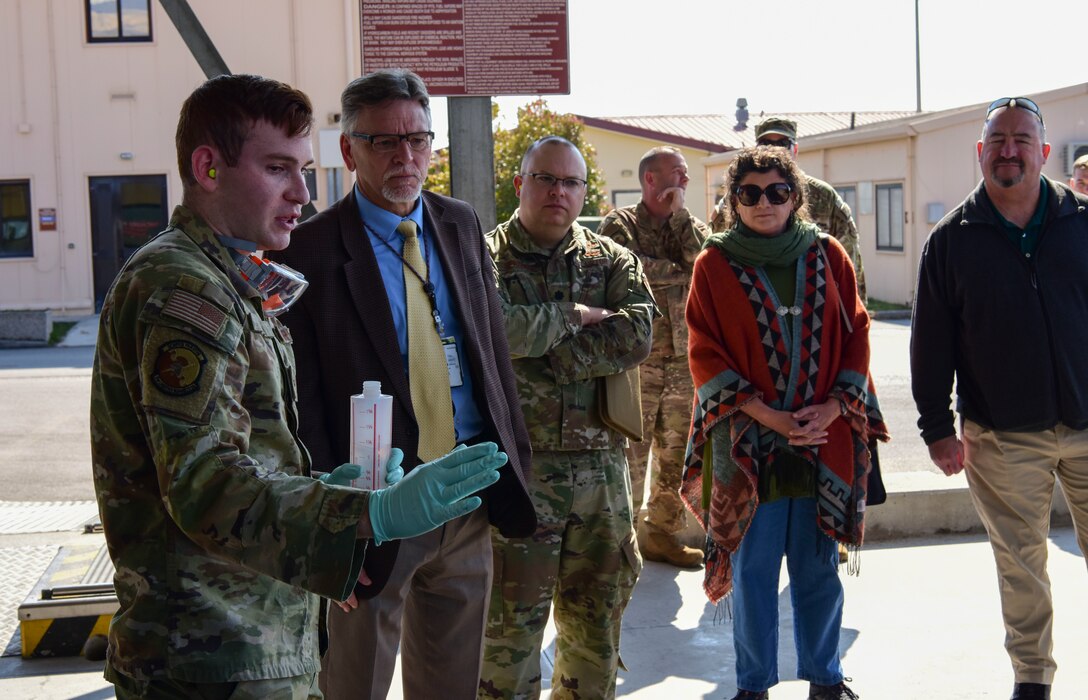 Senior Airman Anthony Bell, 31st Logistics Readiness squadron fuels service center controller demonstrates capabilities of the new Fluid Powered Additive Injector Carts concept to Mission Support Group leadership