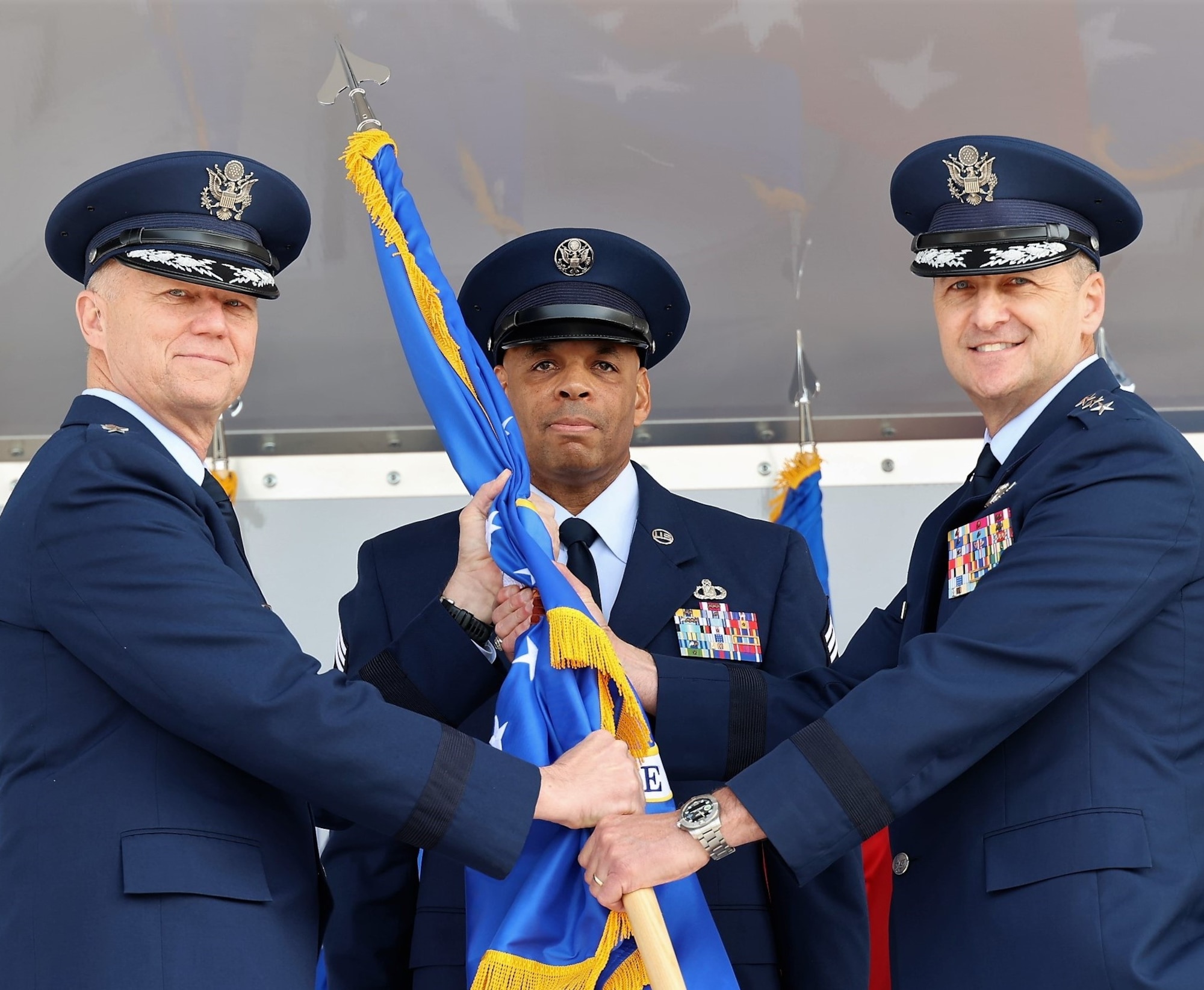 U.S. Air Force Lt. Gen. Steven S. Nordhaus, commander, Continental U.S. North American Aerospace Defense Command Region — First Air Force (Air Forces Northern and Air Forces Space) accepts the 1 AF guidon from Gen. Mark Kelly, commander of Air Combat Command, during a Change of Command ceremony March 31, 2023, Tyndall AFB, Fla. Kelly, along with Gen. James H. Dickinson, commander, U.S. Space Command, and Gen. Glen VanHerck, North American Aerospace Defense Command and United States Northern Command officiated the CONR- 1 AF  (AFNORTH & AFSPACE) Change of Command.