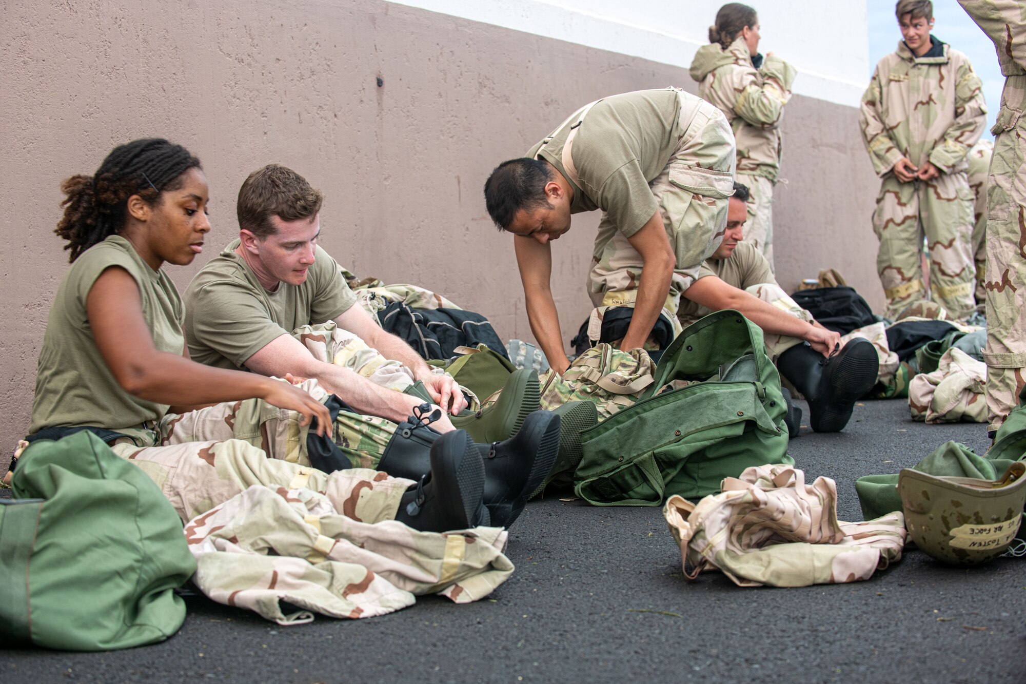 Putting on MOPP gear