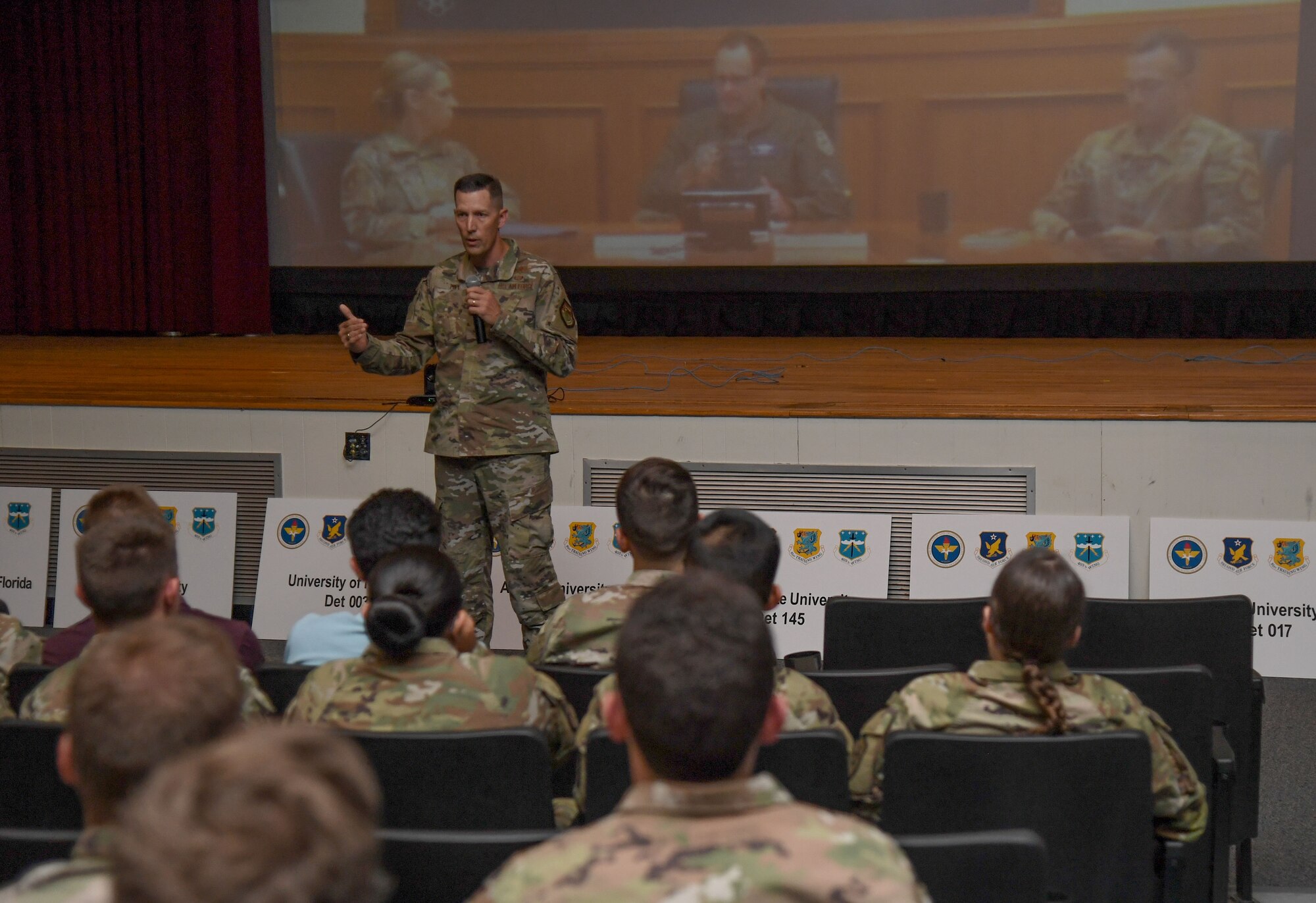 U.S. Air Force Col. Billy Pope, 81st Training Wing commander, delivers welcoming remarks to Air Force ROTC cadets during Pathways to Blue inside the Welch Theater at Keesler Air Force Base, Mississippi, March 31, 2023.