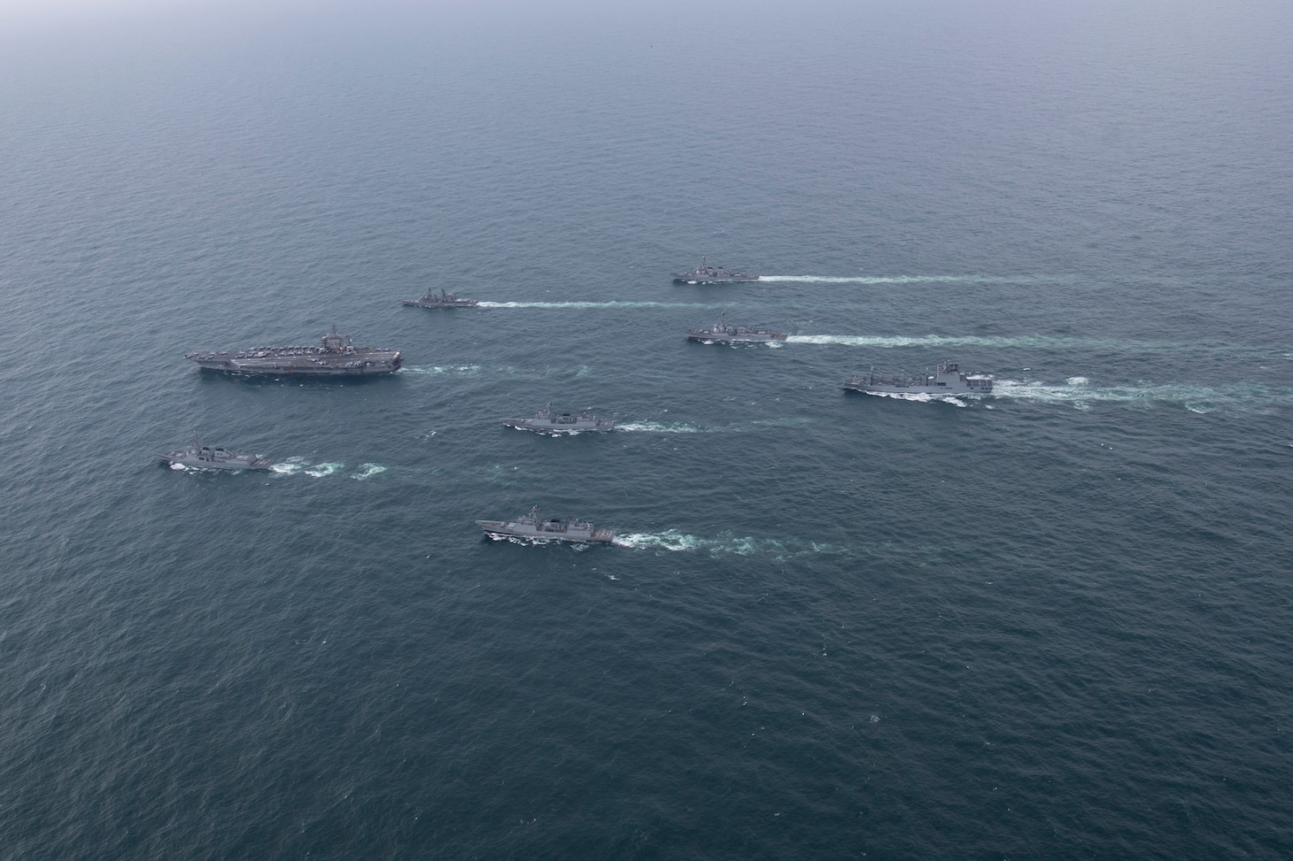 230404-N-KU796-1124 EAST CHINA SEA (April 4, 2023) The aircraft carrier USS Nimitz (CVN 68) steams in formation with the Japan Maritime Self-Defense Force (JMSDF) Asagiri-class destroyer JS Umigiri (DD 158), Republic of Korea (ROK) Sejong the Great-class destroyer ROKS Yul Gok Yi (DDG 992), Chungmugong Yi Sun-Shin-class destroyers ROKS Dae Jo young (DDH 977) and ROKS Choi Young (DDH 981), So Yang-class fast combat support ship ROKS So Yang (AOE 51), and the Arleigh Burke-class guided-missile destroyers USS Decatur (DDG 73) and USS Wayne E. Meyer (DDG 108). The Nimitz Carrier Strike Group is conducting a trilateral maritime exercise with the ROK Navy and JMSDF in the U.S. 7th Fleet area of operations. 7th Fleet is the U.S. Navy's largest forward-deployed numbered fleet, and routinely interacts and operates with allies and partners in preserving a free and open Indo-Pacific region. (U.S. Navy photo by Mass Communication Specialist 2nd Class Samuel Osborn)