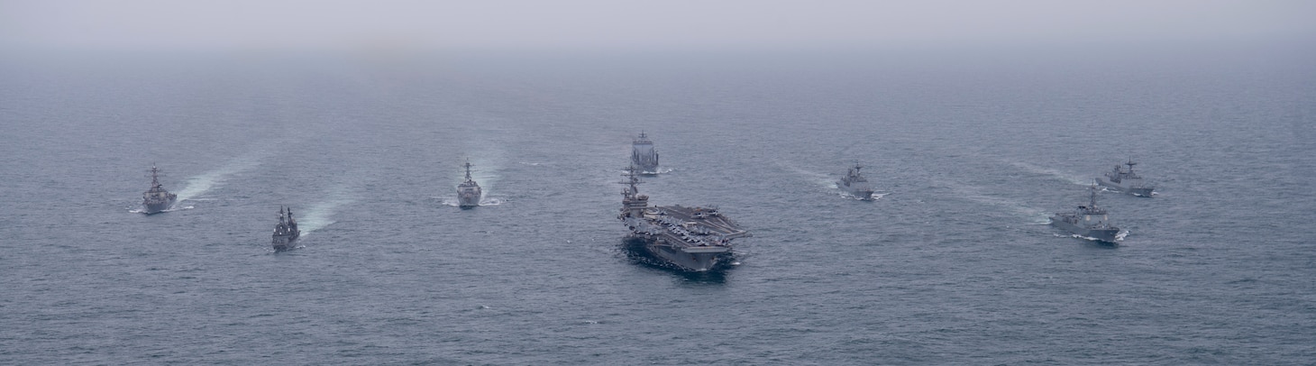 EAST CHINA SEA (April 4, 2023) The aircraft carrier USS Nimitz (CVN 68) steams in formation with the Japan Maritime Self-Defense Force (JMSDF) Asagiri-class destroyer JS Umigiri (DD 158), Republic of Korea (ROK) Sejong the Great-class destroyer ROKS Yul Gok Yi (DDG 992), Chungmugong Yi Sun-Shin-class destroyers ROKS Dae Jo young (DDH 977) and ROKS Choi Young (DDH 981), So Yang-class fast combat support ship ROKS So Yang (AOE 51), and the Arleigh Burke-class guided-missile destroyers USS Decatur (DDG 73) and USS Wayne E. Meyer (DDG 108). The Nimitz Carrier Strike Group is conducting a trilateral maritime exercise with the ROK Navy and JMSDF in the U.S. 7th Fleet area of operations. 7th Fleet is the U.S. Navy's largest forward-deployed numbered fleet, and routinely interacts and operates with allies and partners in preserving a free and open Indo-Pacific region. (U.S. Navy photo by Mass Communication Specialist 2nd Class Samuel Osborn)