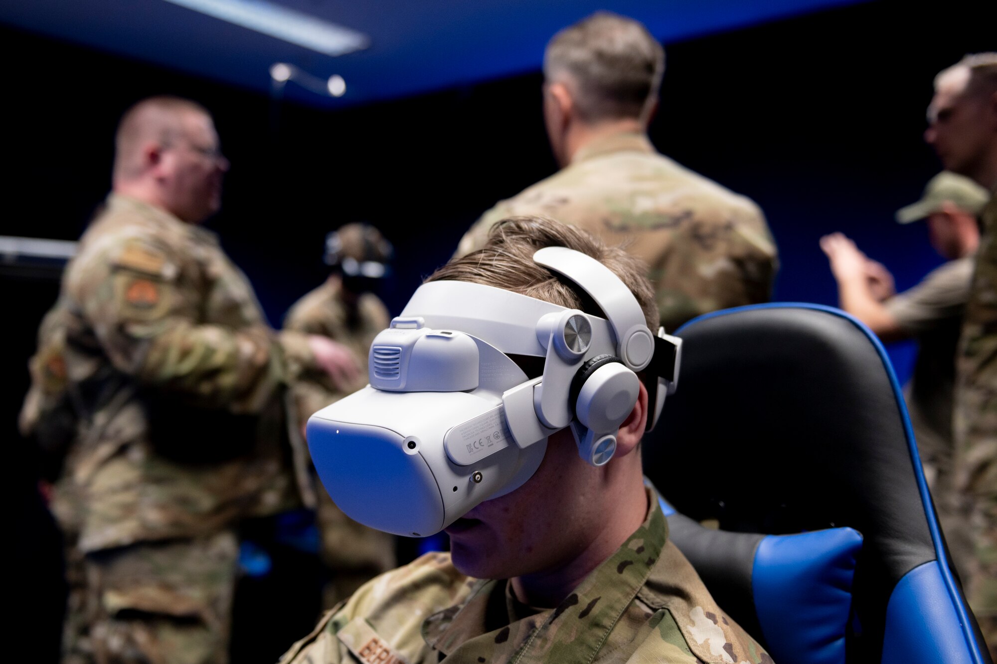 A young soldier wears a VR headset