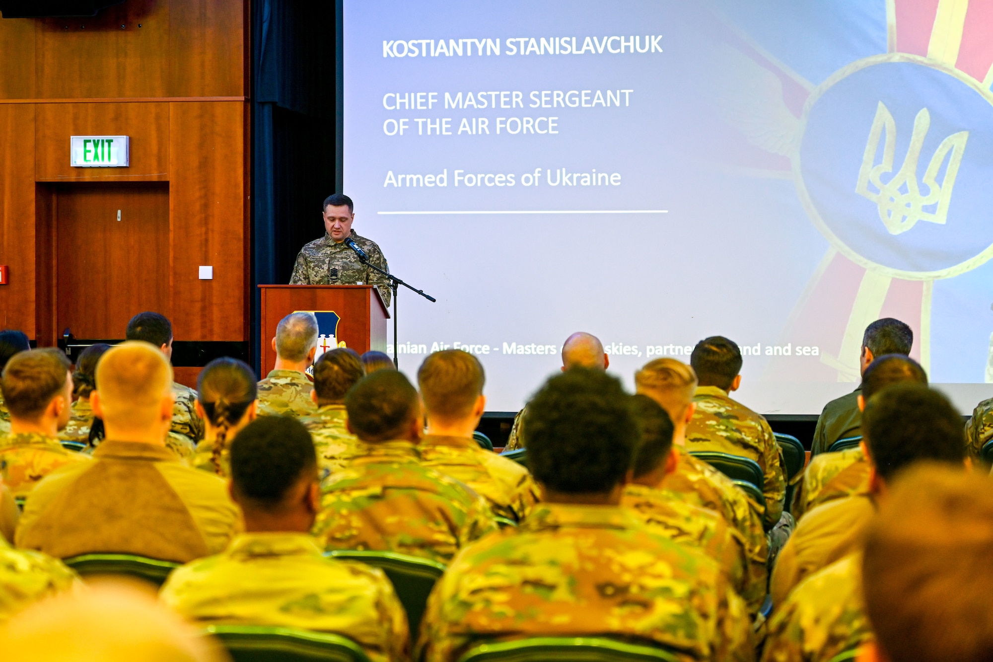 Chief Master Sgt. of the Air Force of the Armed Forces of Ukraine Kostiantyn Stanislavchuk speaks to attendees of an all-call