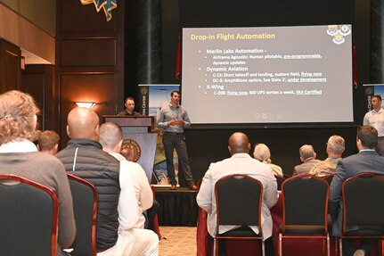 Members from team Rebellion, Cohort 4, Academia Industry Military-Hybrid Innovation, pitch innovative solutions to military leadership during a one-day capstone event in Washington March 31, 2023. Teams proposed solutions for emerging national defense problems.