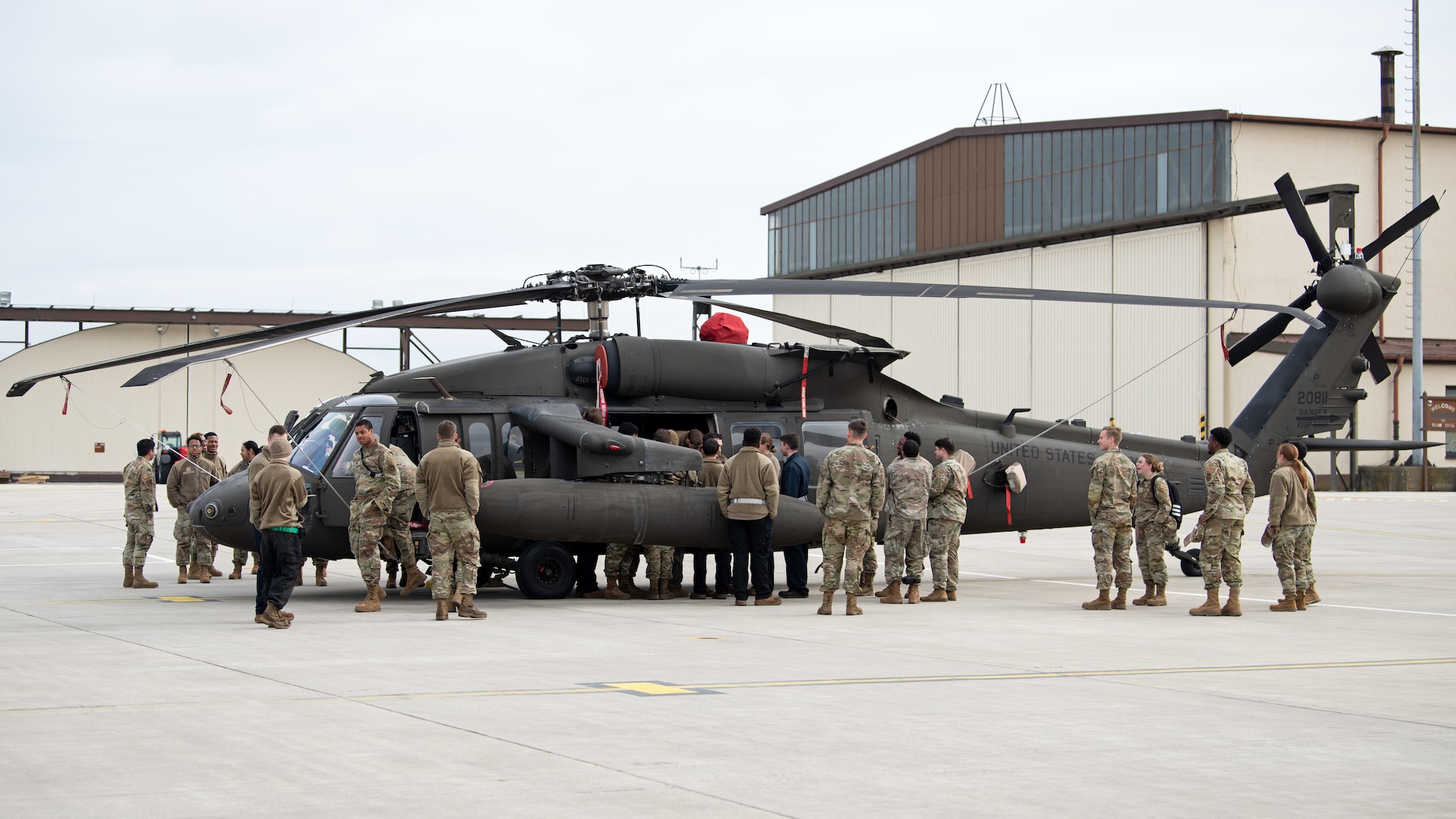 People look at U.S. Army helicopters