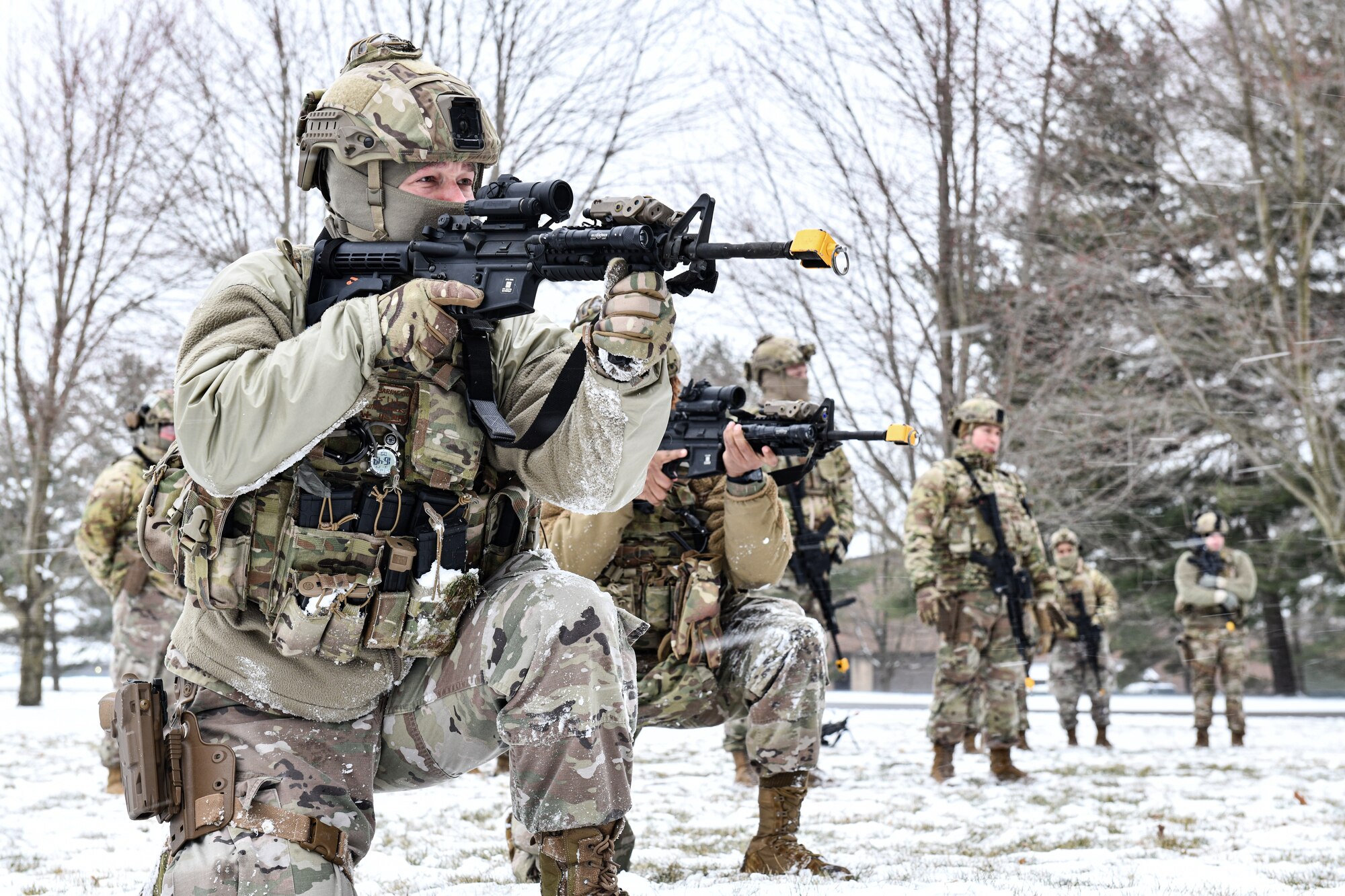 Airmen assigned to the 459th Security Forces Squadron, Joint Base Andrews, Maryland, practice tactical fire maneuvers on March 14, 2023, at Youngstown Air Reserve Station, Ohio.