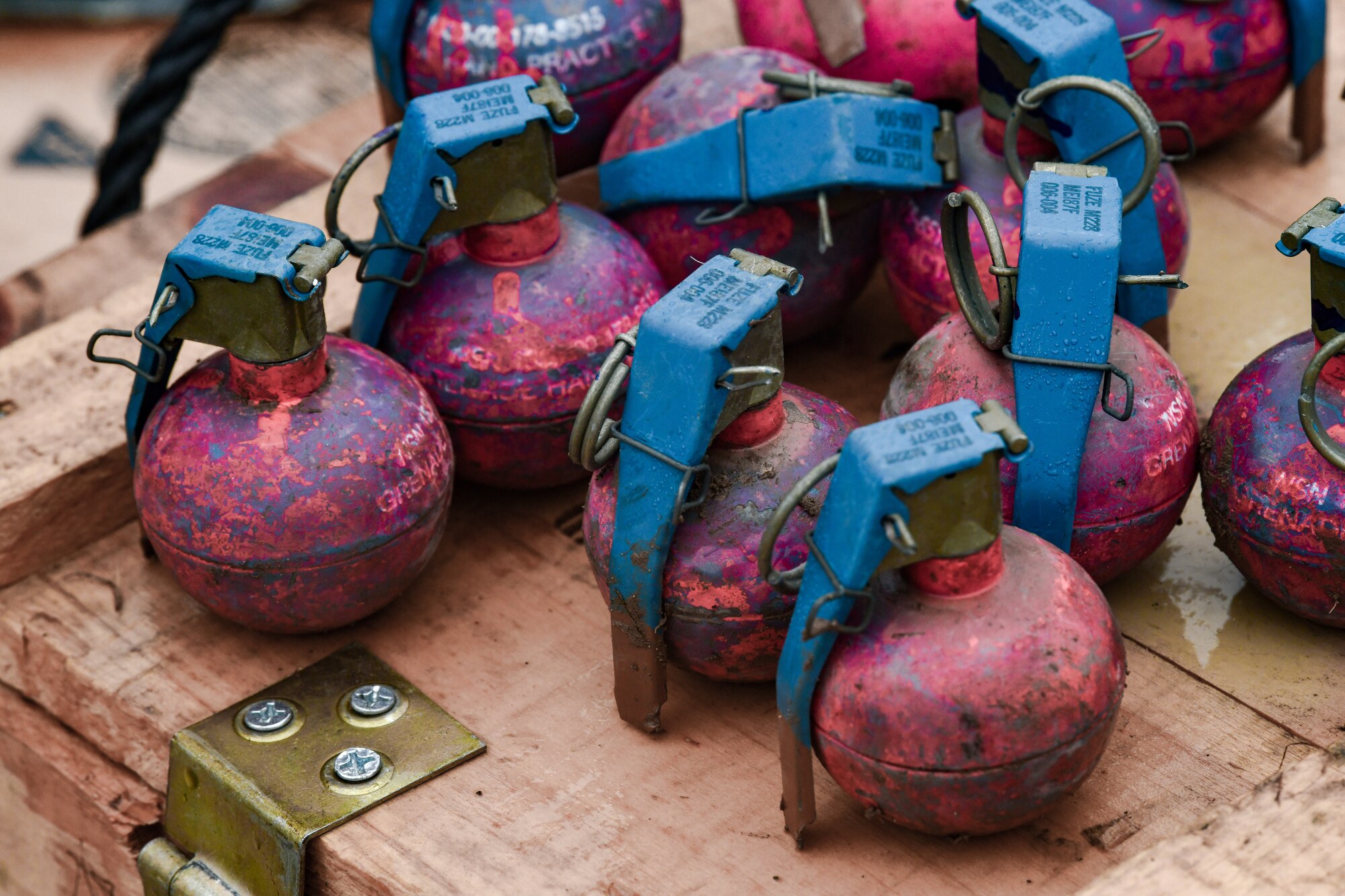 Practice grenades rest on a box, March 17, 2023, at Camp James A. Garfield Joint Military Training Center, Ohio.