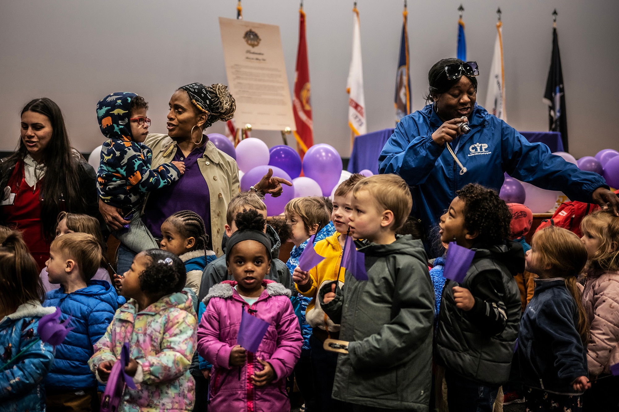 A photograph depicting a ceremony for the Month of the Military Child.