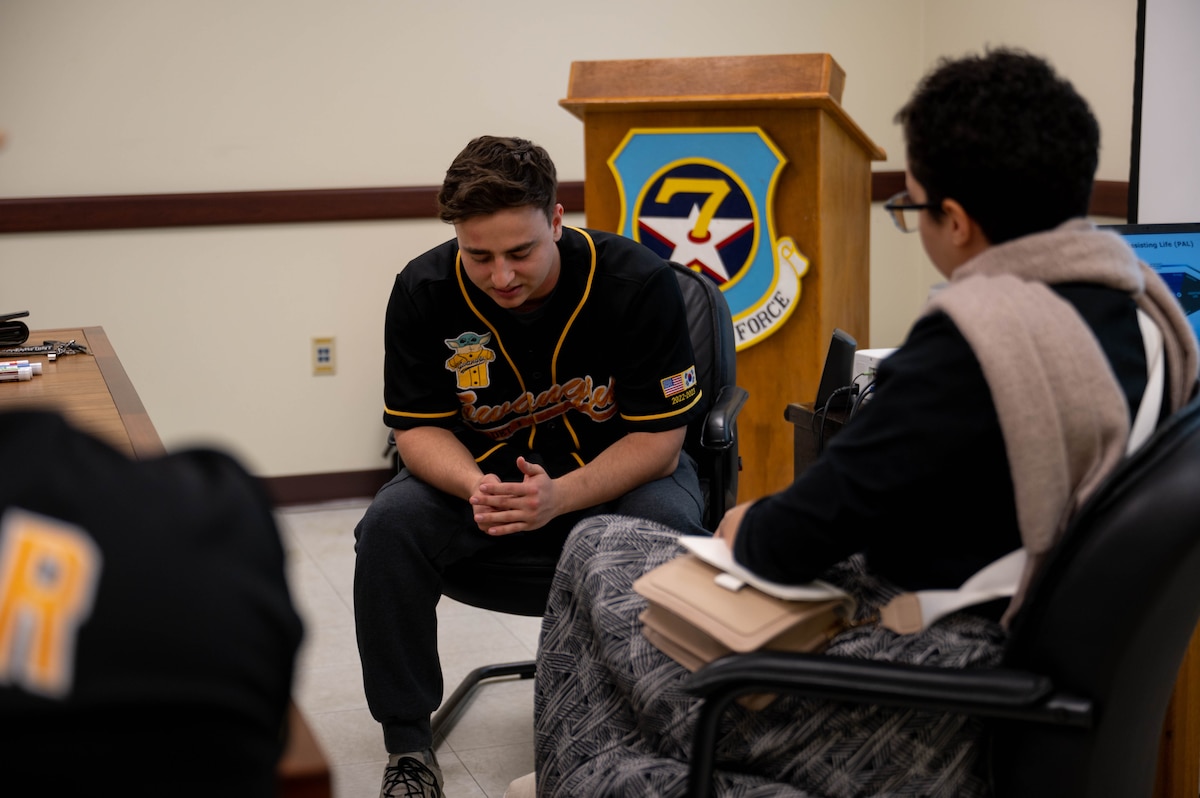 Airman 1st Class Thomas Addams, 607th Materiel Maintenance Squadron, Detachment 1, communication technician, solemnly participates in an Applied Suicide Intervention Skills Training scenario at Gwangju Air Base, Republic of Korea, Mar. 31, 2023.