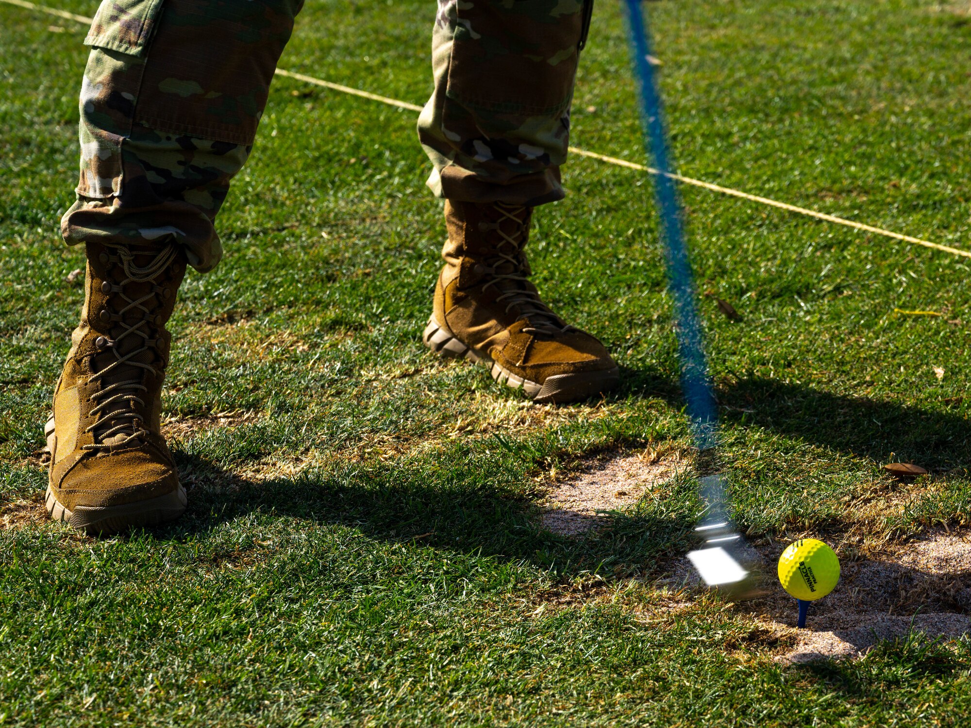 A U.S. Air Force Airman drives a golf ball during Luke Air Force Base’s Base’s Sexual Assault Awareness and Prevention Month event April 3, 2023, at Falcon Dunes Golf Course, Glendale, Arizona