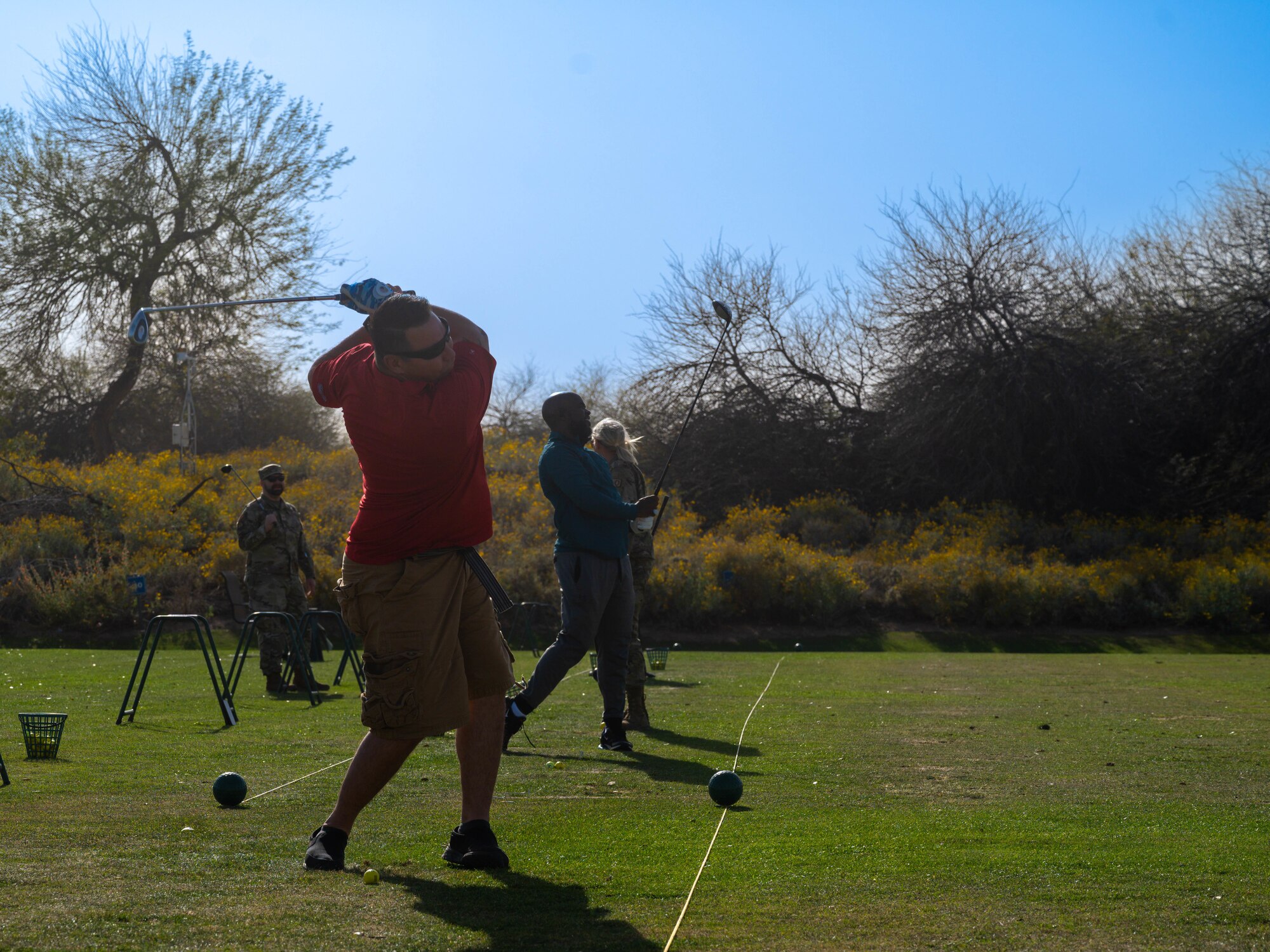 U.S. Air Force Airmen assigned to the 56th Fighter Wing participate in Luke AFB’s Sexual Assault Awareness and Prevention Month event April 3, 2023, at Falcon Dunes Golf Course, Glendale, Arizona.