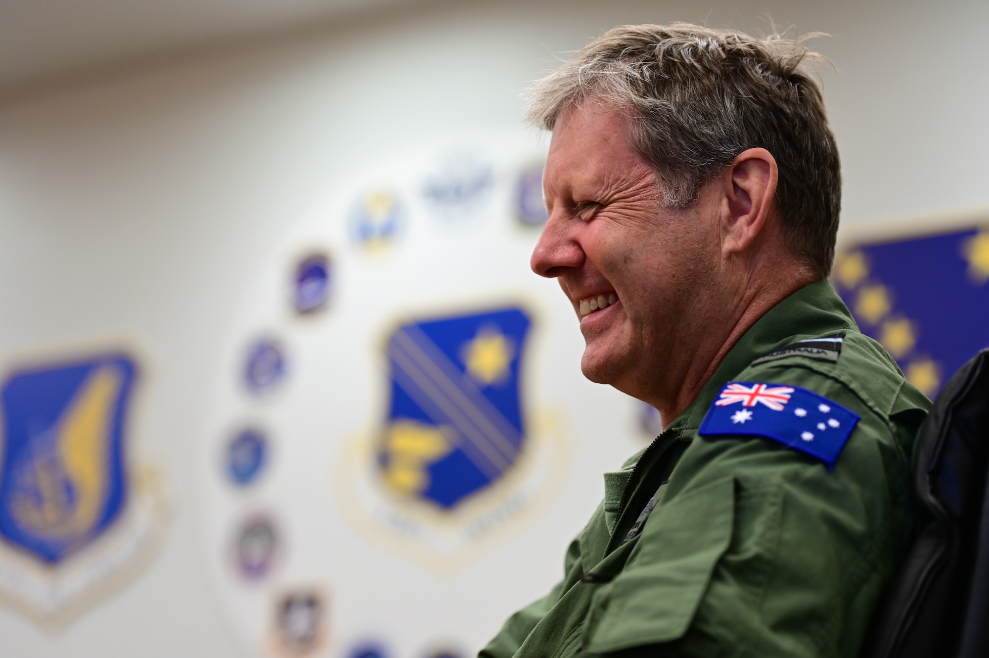 Royal Australian Air Force Air Vice-Marshal Carl Newman, Pacific Air Forces deputy commander, meets with 212th Rescue Squadron command team at Joint Base Elmendorf-Richardson, Alaska, March 28, 2023. Newman serving as the PACAF DCOM demonstrates a steadfast commitment between the U.S. and Australia. During Newman’s visit, he met with JBER commanders, chiefs, and Airmen to get a better understanding of both ongoing and upcoming Arctic operations. (U.S. Air Force photo by Airman 1st Class Quatasia Carter)