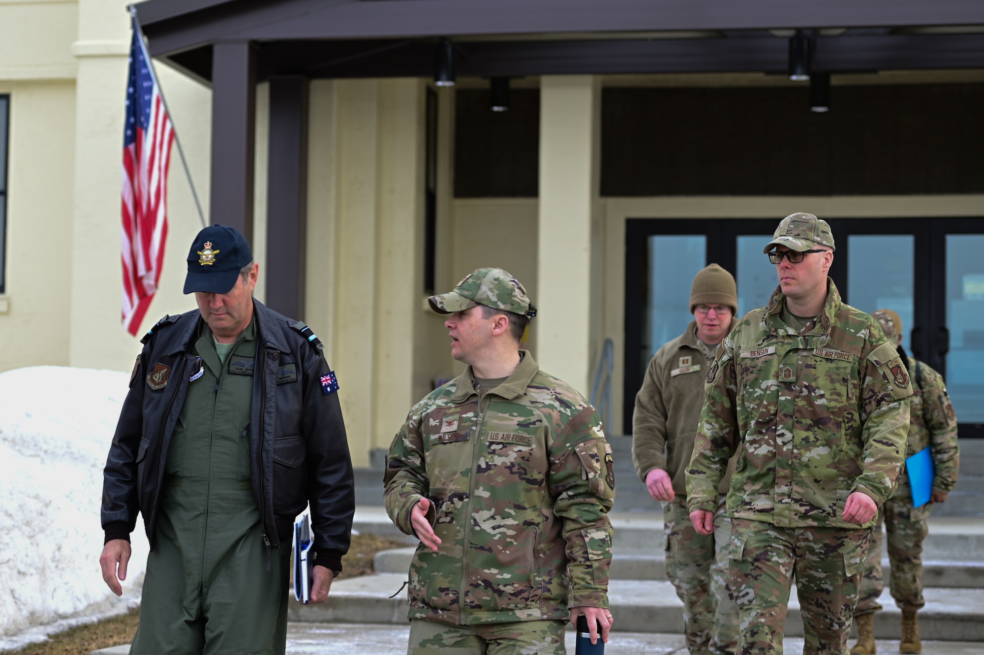 Royal Australian Air Force Air Vice-Marshal Carl Newman, Pacific Air Forces deputy commander, meets with U.S. Air Force Col. David Wilson, Joint Base Elmendorf-Richardson and 673d Air Base Wing commander, at JBER, Alaska, March 29, 2023. Wilson gave Newman a tour of the base, with emphasis on infrastructure requirements. (U.S. Air Force photo by Airman 1st Class Quatasia Carter)