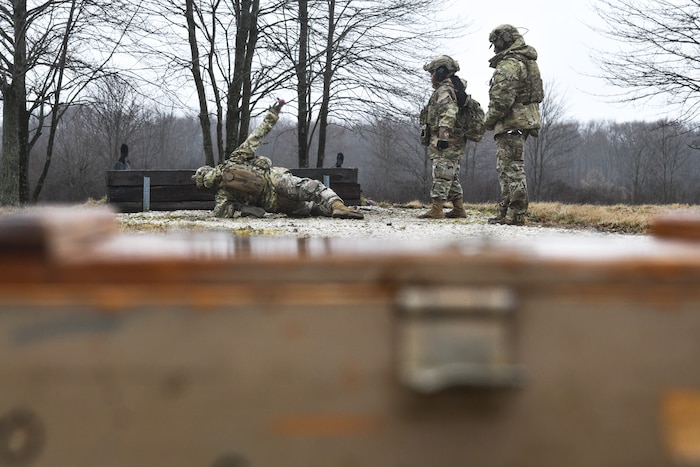 Integrated Defense Leadership Course cadre demonstrate how to throw a grenade on March 17, 2023, at Camp James A. Garfield Joint Military Training Center, Ohio.