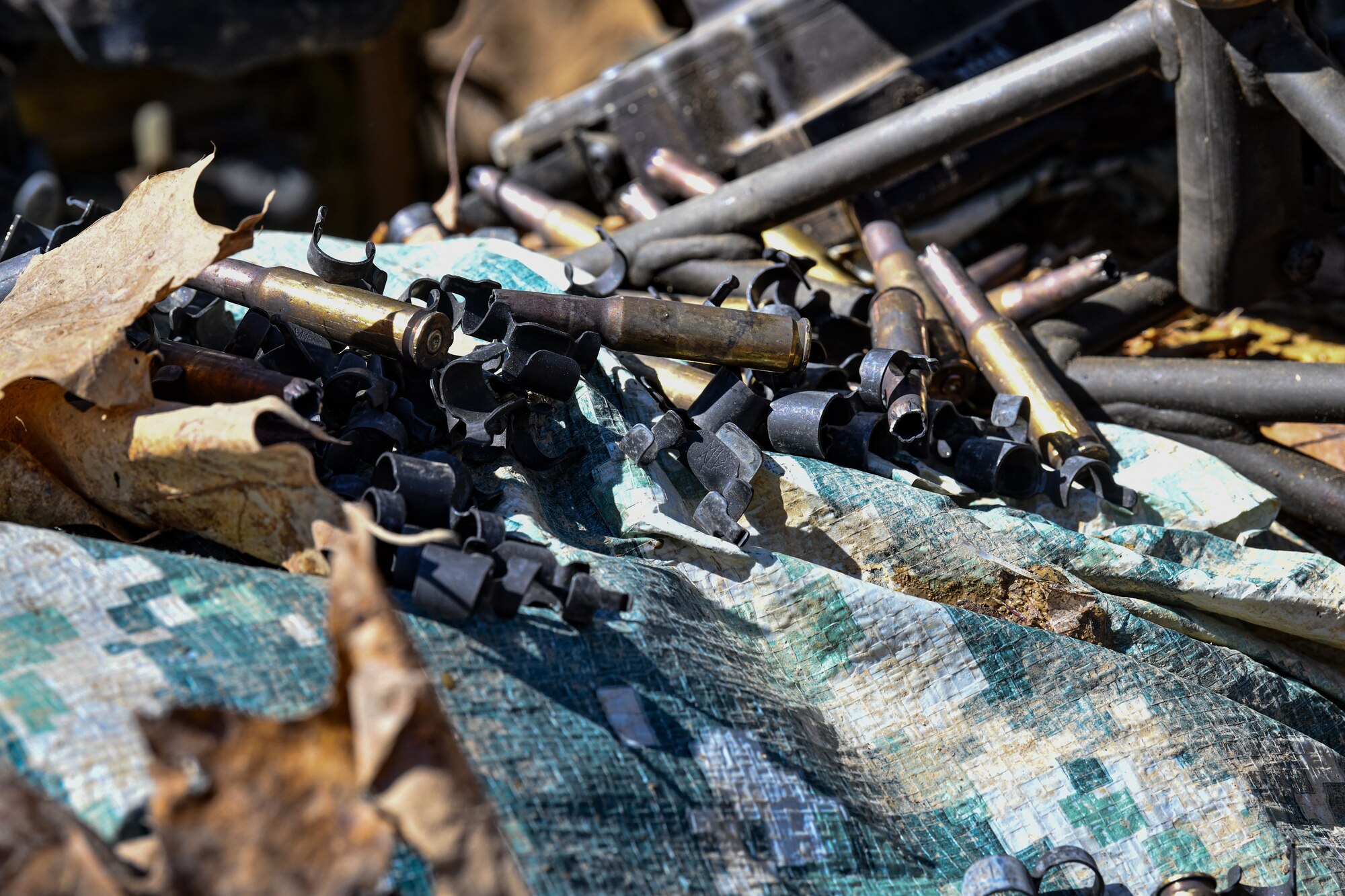 Spent shells from a M240B machine gun rest on the ground, March 20, 2023, at Camp James A. Garfield Joint Military Training Center, Ohio.