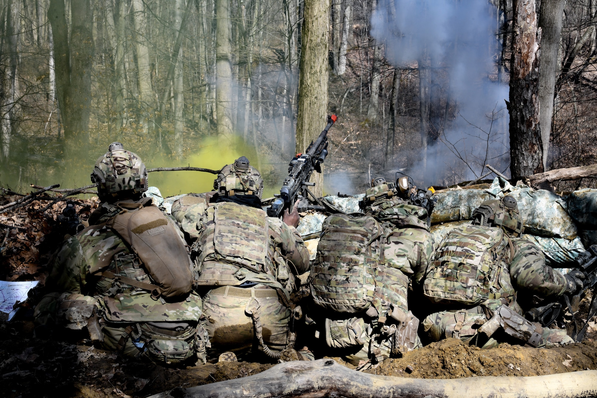 Reserve Citizen Airmen assigned to the 459th Security Forces Squadron, Joint Base Andrews, Maryland, take cover during a static defense exercise on March 20, 2023, at Camp James A. Garfield Joint Military Training Center, Ohio.