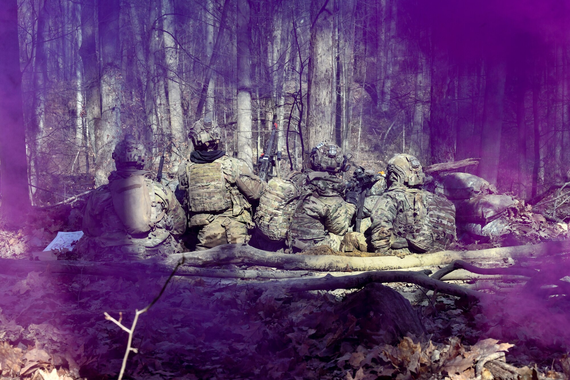 Reserve Citizen Airmen assigned to the 459th Security Forces Squadron, Joint Base Andrews, Maryland, fire M4 carbines and a M240B machine gun during a static defense exercise on March 20, 2023, at Camp James A. Garfield Joint Military Training Center, Ohio.