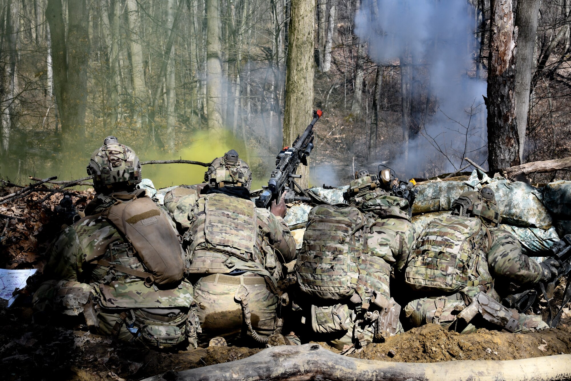 Reserve Citizen Airmen assigned to the 459th Security Forces Squadron, Joint Base Andrews, Maryland, take cover during a static defense exercise on March 20, 2023, at Camp James A. Garfield Joint Military Training Center, Ohio.