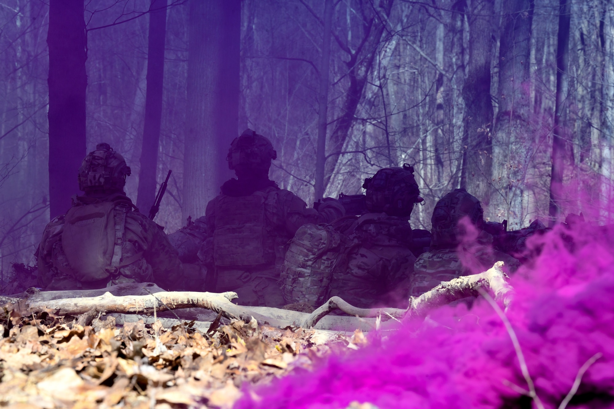 Reserve Citizen Airmen assigned to the 459th Security Forces Squadron, Joint Base Andrews, Maryland, fire M4 carbines and a M240B machine gun during a static defense exercise on March 20, 2023, at Camp James A. Garfield Joint Military Training Center, Ohio.