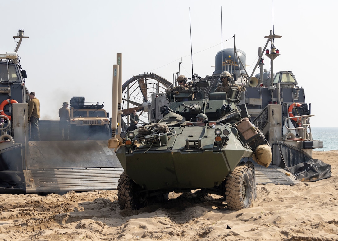 HWAJIN-RI BEACH, Republic of Korea (March 29, 2023) – U.S. Marines with Battalion Landing Team 2/4, 13th Marine Expeditionary Unit, drive a light armored vehicle off a landing craft, air cushion during an amphibious assault training exercise for Ssang Yong 23. Celebrating the 70th anniversary of the U.S. - ROK Alliance, Ssang Yong 2023 strengthens the Alliance through bilateral, joint training, contributing toward the ROK's combined defense of the Korean Peninsula and increasing the readiness of the U.S. -ROK Alliance. (U.S. Marine Corps photo by Staff Sgt. Kevin G. Rivas)