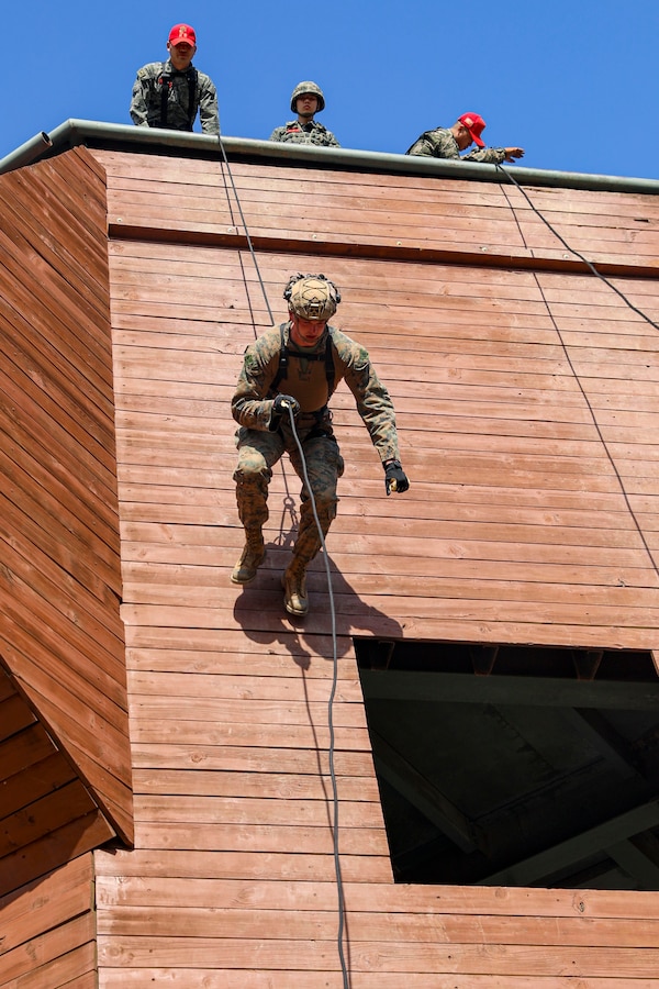 POHANG, Republic of South Korea (March 27, 2023) – U.S. Marine Corps Sgt. Jake Augustine, a machine gunner with Battalion Landing Team 2/4, 13th Marine Expeditionary Unit, conducts an Aussie rappel during rope training during Ssang Yong 23. Celebrating the 70th anniversary of the U.S.-ROK Alliance, Ssang Yong 2023 strengthens the Alliance through bilateral, joint training, contributing toward the ROK’s combined defense of the Korean Peninsula and increasing the readiness of the U.S.-ROK Alliance. (U.S. Marine Corps Photo by Sgt. Brendan Custer)