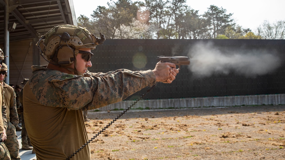 POHANG, Republic of Korea (March 30, 2023) – U.S. Marine Corps Cpl. Von Landry a scout sniper with Battalion Landing Team 2/4, 13th Marine Expeditionary Unit, fires his M18 pistol during a pistol qualification range, March 30. Celebrating the 70th anniversary of the U.S.-ROK Alliance, Ssang Yong 2023 strengthens the Alliance through bilateral, joint training, contributing toward the ROK’s combined defense of the Korean Peninsula and increasing the readiness of the U.S.-ROK Alliance. (U.S. Marine Corps Photo by Sgt. Brendan Custer)