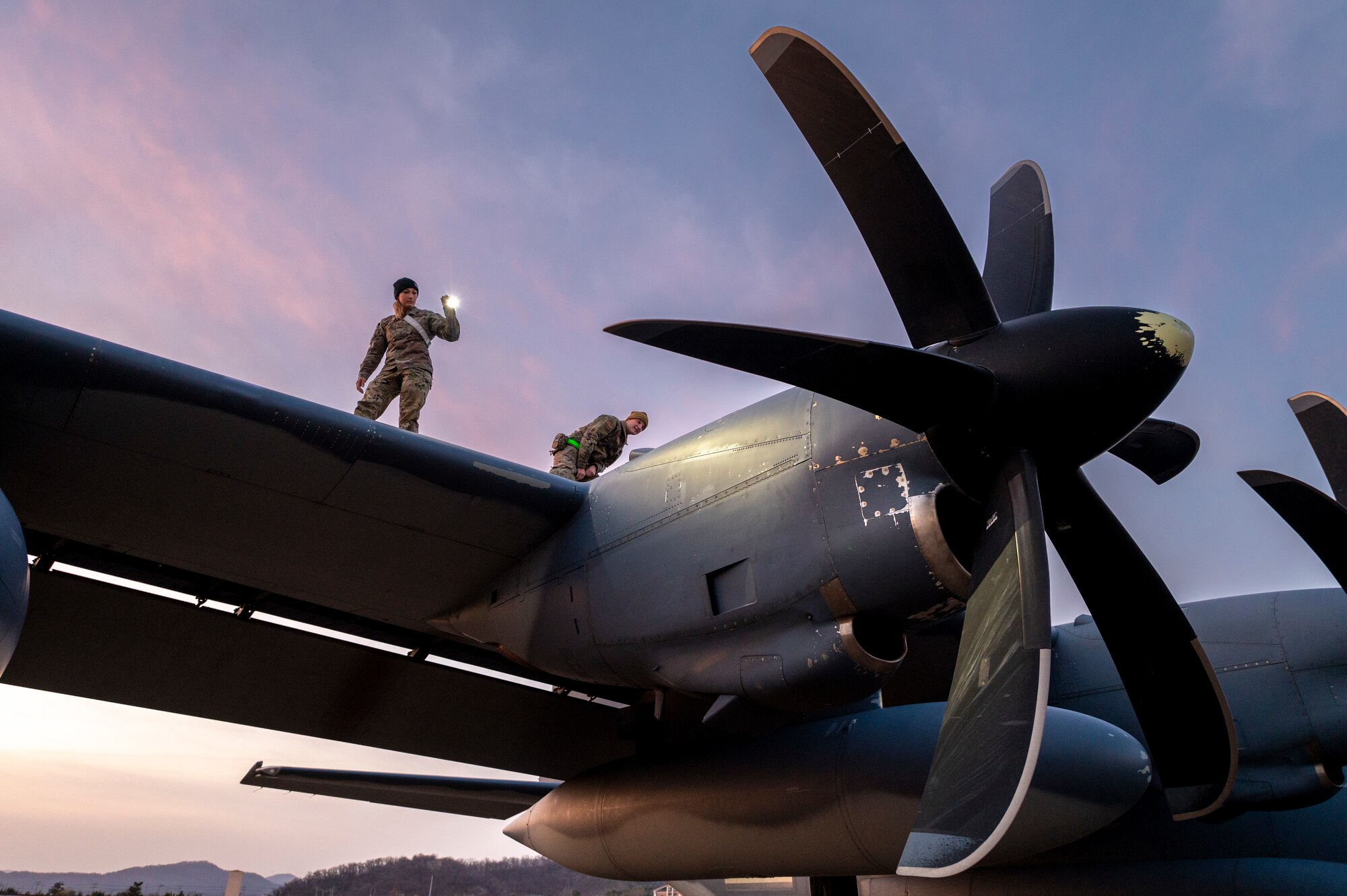 U.S. Airmen assigned to the 353rd Special Operations Aircraft Maintenance Squadron inspect the propellers of an MC-130J Commando II in support of Freedom Shield 23 at Daegu Air Base, Republic of Korea, Mar. 13, 2023.