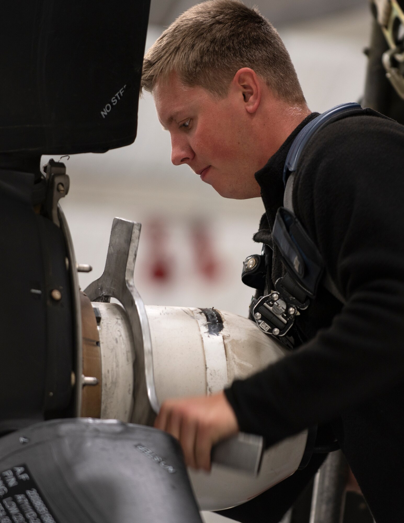 U.S. Air Force Airman 1st Class Jesse Carlson, propulsion mechanic, 133rd Maintenance Squadron, loses the dome assembly on a T56-A-15 rolls royce allison engine in St. Paul, Minn., Oct. 24, 2022.