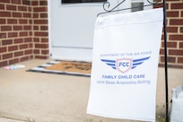 A Family Child Care banner stands out front of an FCC provider’s home on March 31, 2023, at Joint Base Anacostia-Bolling, Washington, D.C. FCC providers care for children in the provider’s home, which increases child care capacity for the JBAB community while simultaneously creating work-from-home employment opportunities. (U.S. Air Force photo by Jason Treffry)