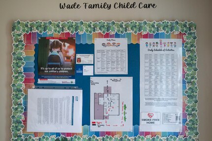 Daily schedules and safety information are displayed at the entrance of a Family Child Care provider’s home on March 31, 2023, at Joint Base Anacostia-Bolling, Washington, D.C. FCC providers care for children in the provider’s home, which increases child care capacity for the JBAB community while simultaneously creating work-from-home employment opportunities. (U.S. Air Force photo by Jason Treffry)