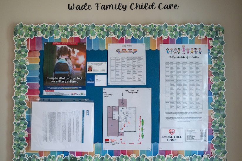 Daily schedules and safety information are displayed at the entrance of a Family Child Care provider’s home on March 31, 2023, at Joint Base Anacostia-Bolling, Washington, D.C. FCC providers care for children in the provider’s home, which increases child care capacity for the JBAB community while simultaneously creating work-from-home employment opportunities. (U.S. Air Force photo by Jason Treffry)