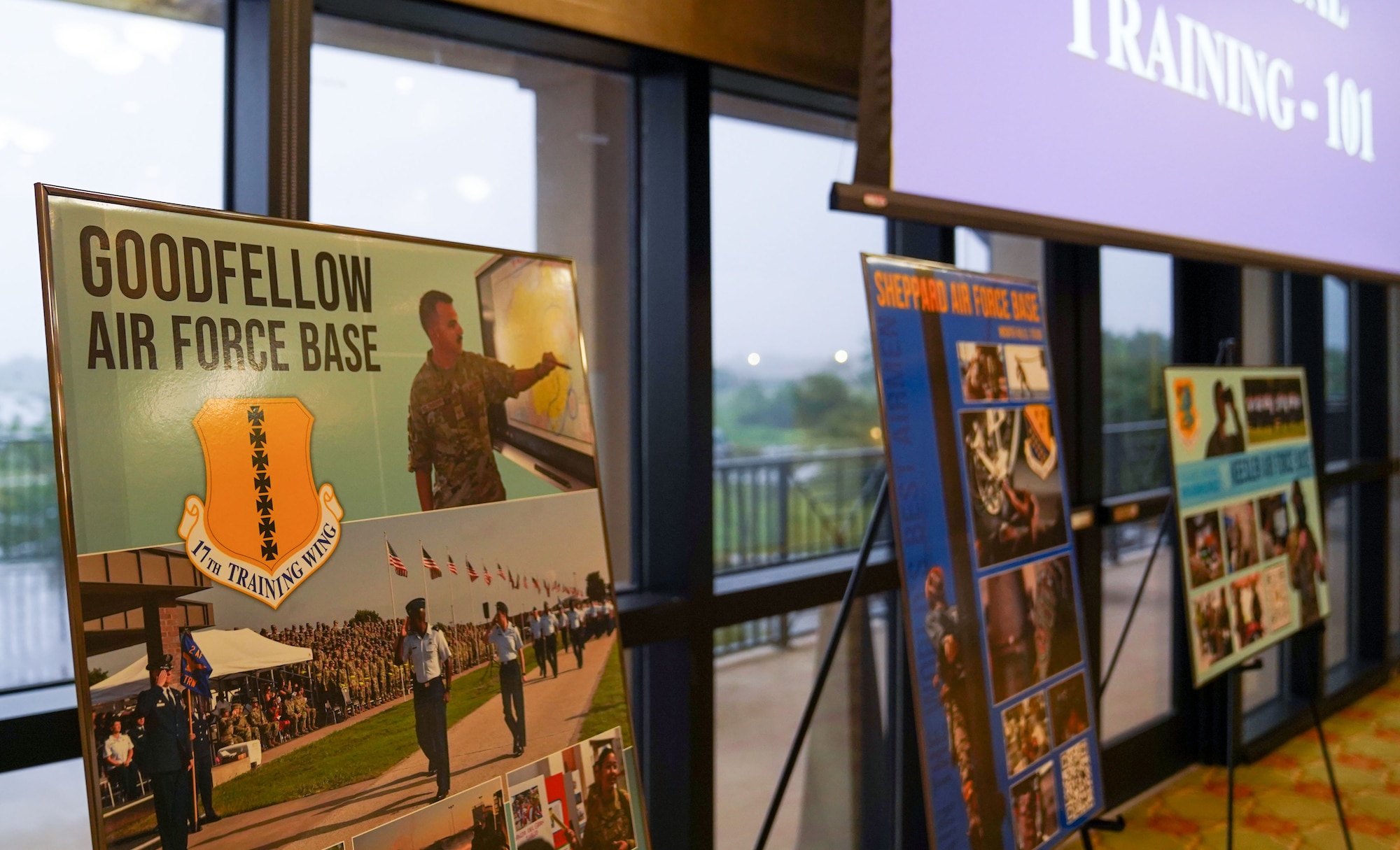 Posters for each of the five Second Air Force wings are displayed at Technical Training 101 in the Bay Breeze Event Center on Keesler Air Force Base, Mississippi, March 28, 2023.