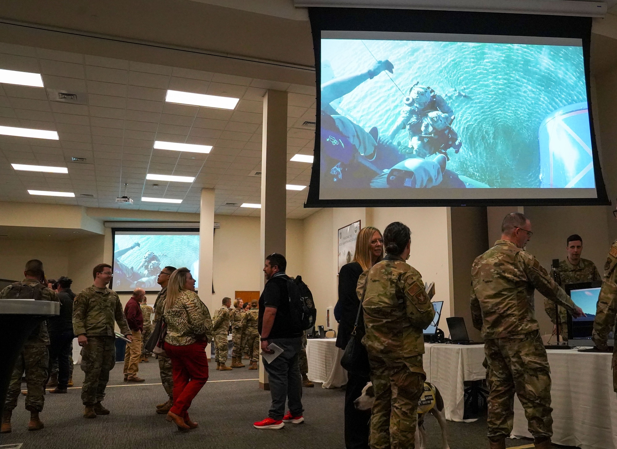 Attendees of the Technical Training 101 visit the tech expo booths at Keesler Air Force Base, Mississippi, March 30, 2023.